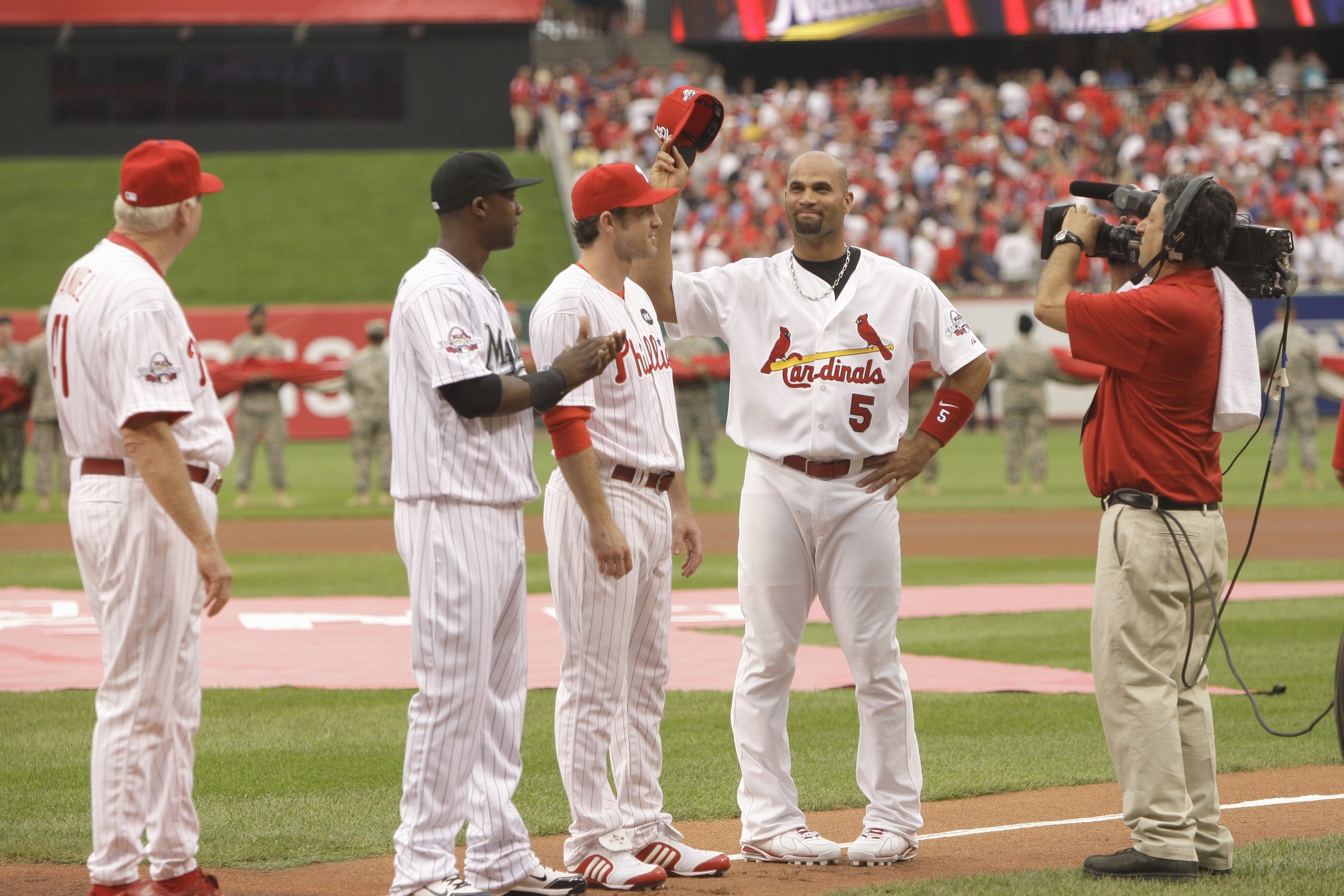 ST LOUIS, MO - JULY 14: National League All-Star Albert Pujols of St. Louis Cardinals waves to fans before the 2009 MLB All-Star Game against the American League All-Stars at Busch Stadium on July 14, 2009 in St Louis, Missouri. (Photo by: Pool/Getty Imag