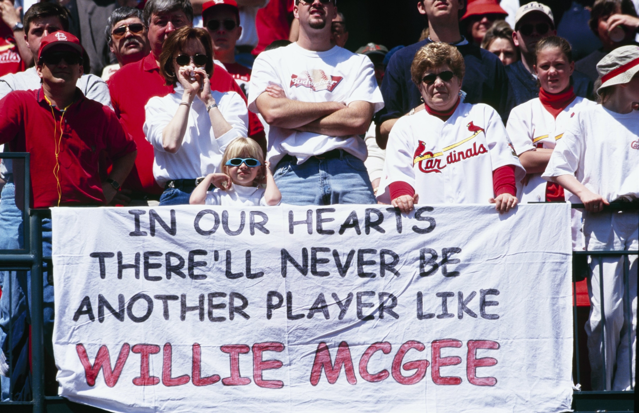 ST. LOUIS - APRIL 9:  St. Louis Cardinals fans display a banner during Willie McGee Day before the game against the Milwaukee Brewers at Busch Stadium on April 9, 2000 in St. Louis, Missouri. (Photo by Elsa/Getty Images)