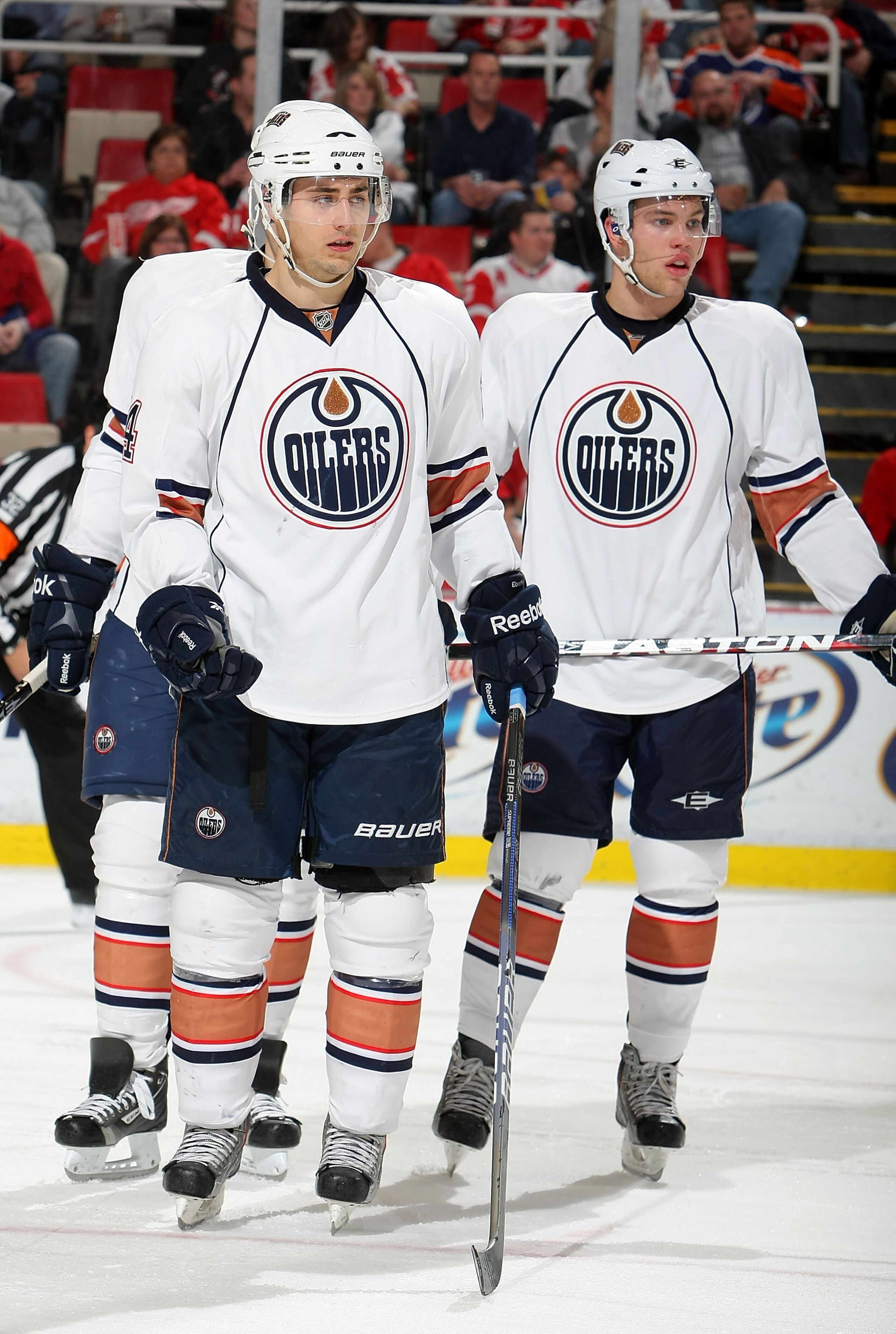 DETROIT - NOVEMBER 11:  Jordan Eberle #14 of the Edmonton Oilers and teammate Taylor Hall #4 prepare for a face-off against the Detroit Red Wings during their NHL game at Joe Louis Arena on November 11, 2010 in Detroit, Michigan.  (Photo by Dave Sandford/
