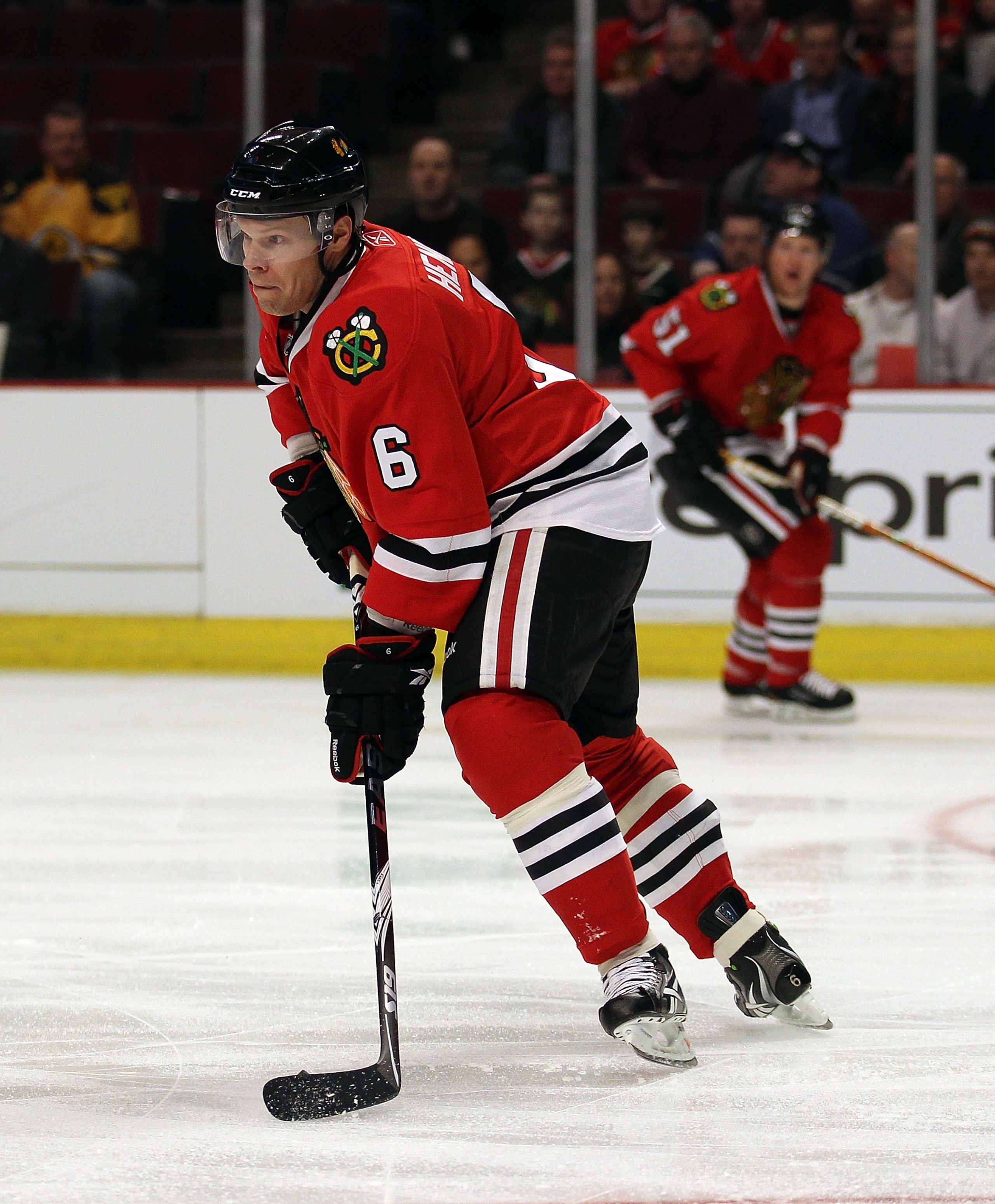 CHICAGO, IL - FEBRUARY 16: Jordan Hendry #6 of the Chicago Blackhawks passes against the Minnesota Wild at the United Center on February 16, 2011 in Chicago, Illinois. The Blackhawks defeated the Wild 3-1.  (Photo by Jonathan Daniel/Getty Images)