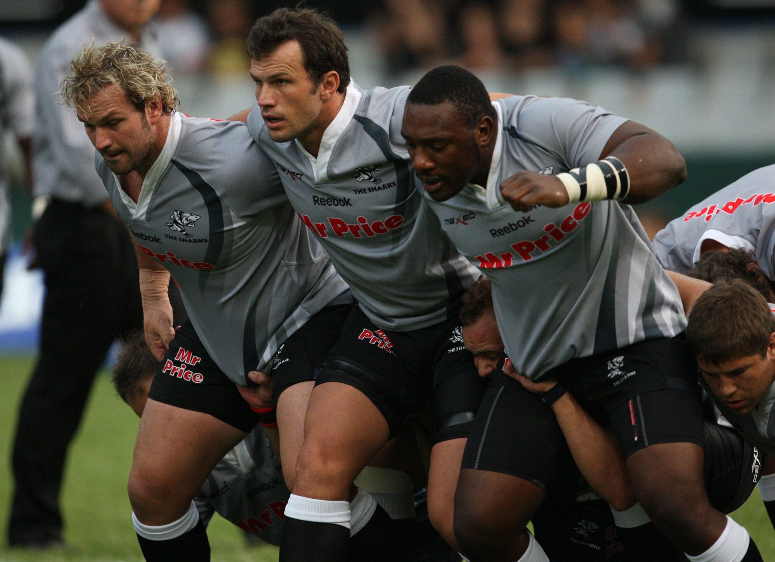 DURBAN, SOUTH AFRICA - FEBRUARY 19:  Jannie Du Plessis with Bismarck Du Plessis and Tendai Beast Mtawarira compete during the Super Rugby Round 1 match between Sharks and Cheetahs at Mr Price Kings Park Stadium on February 19, 2011 in Durban, South Africa