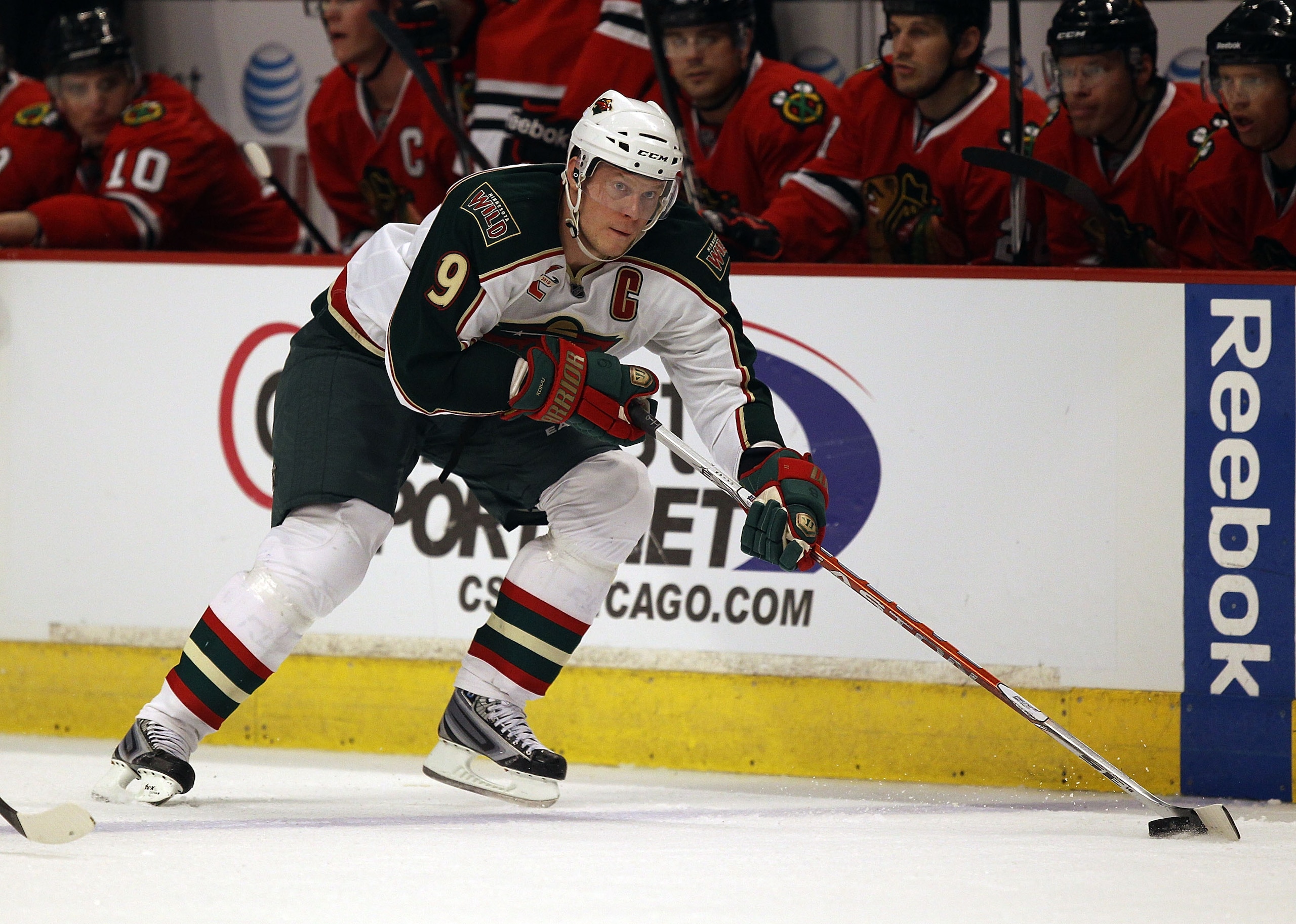 CHICAGO, IL - FEBRUARY 16: Mikko Koivu #9 of the Minnesota Wild skates up the ice against the Chicago Blackhawks at the United Center on February 16, 2011 in Chicago, Illinois. The Blackhawks defeated the Wild 3-1. (Photo by Jonathan Daniel/Getty Images)