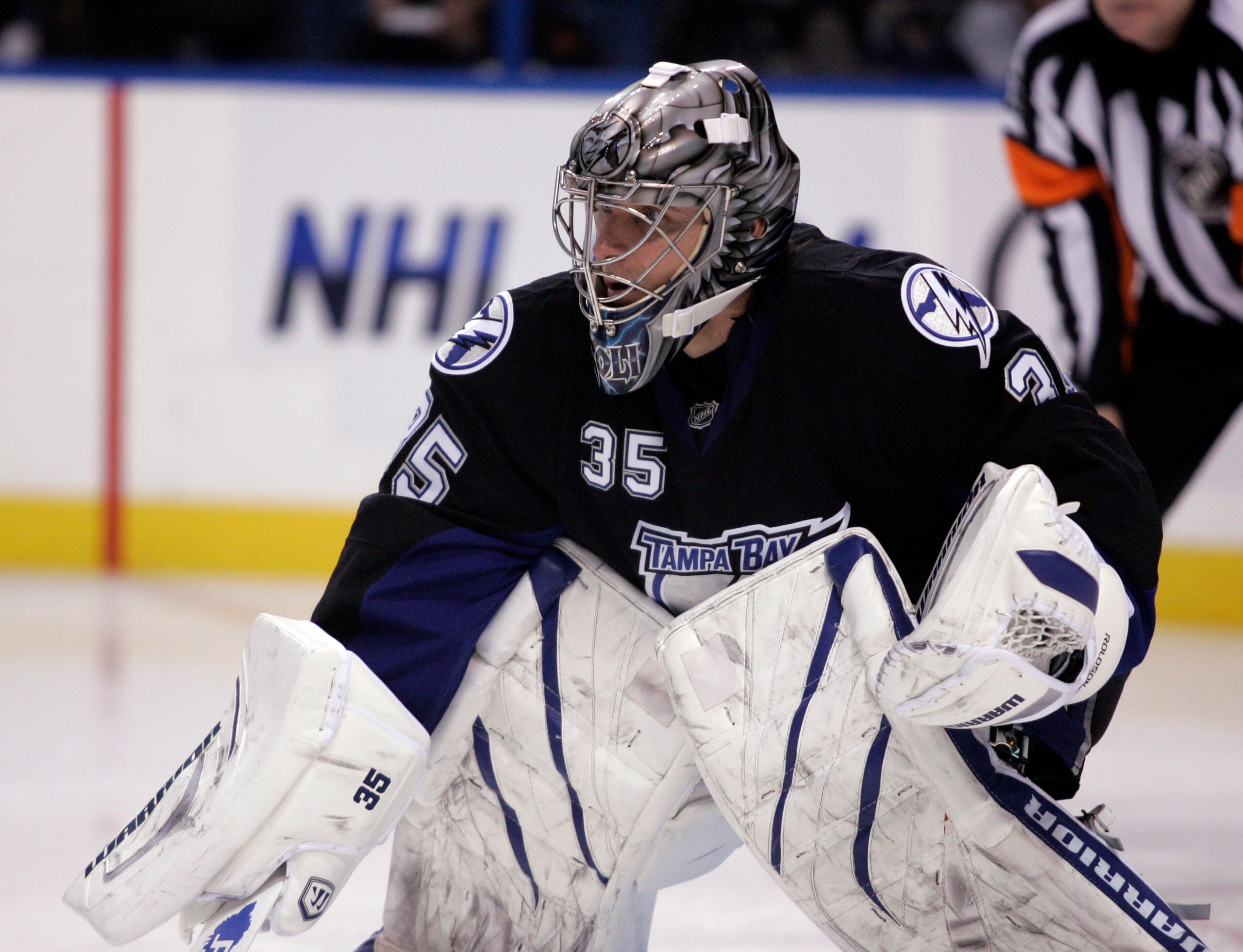 TAMPA, FL - JANUARY 25: Dwayne Roloson #35 of the Tampa Bay Lightning protects the net against the Toronto Maple Leafs at St. Pete Times Forum on January 25, 2011 in Tampa, Florida. The Lightning defeated the Leafs 2-0. (Photo by Justin K. Aller/Getty Ima