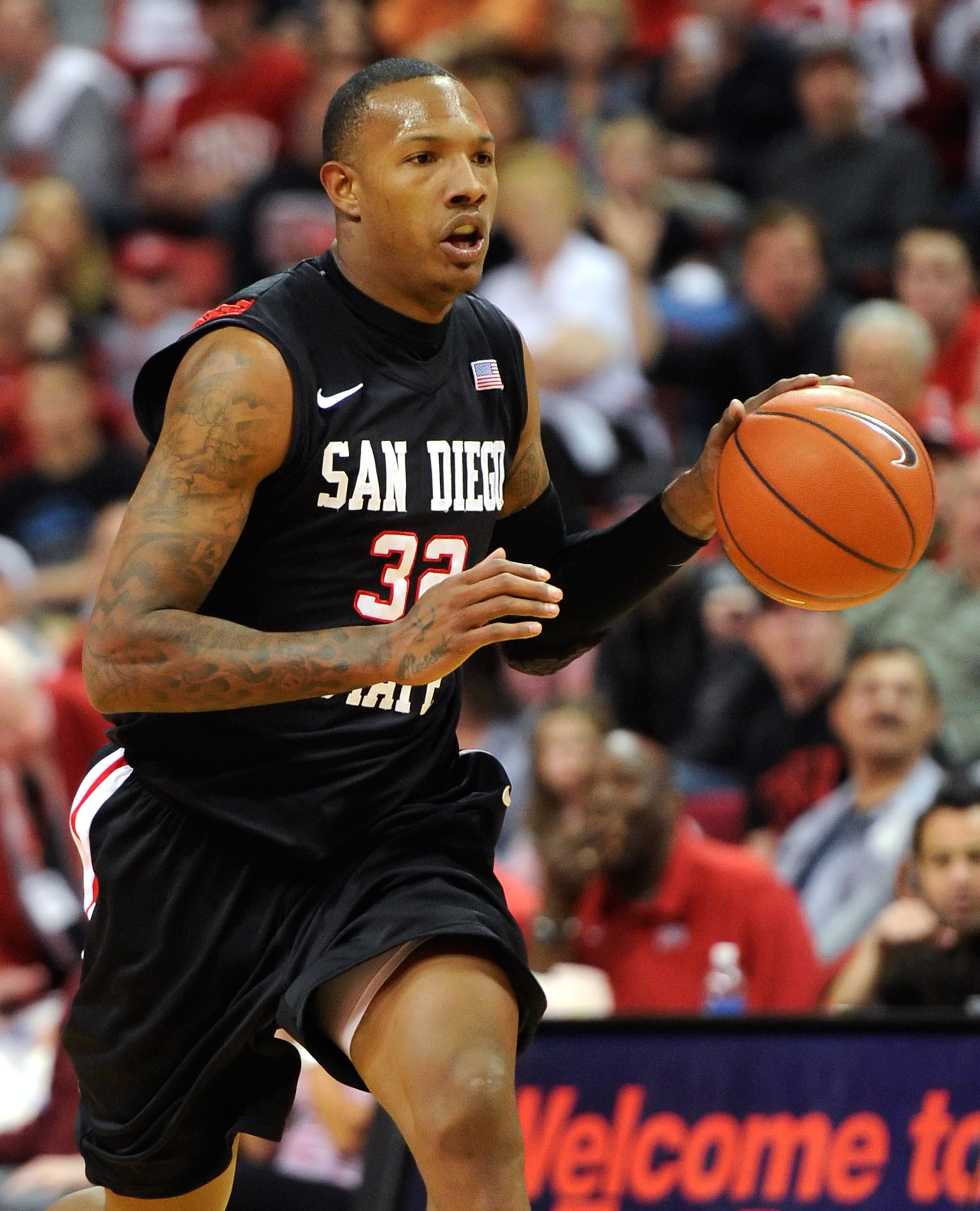 LAS VEGAS, NV - FEBRUARY 12: Billy White #32 of the San Diego State Aztecs brings the ball up the court during a game against the UNLV Rebels at the Thomas & Mack Center February 12, 2011 in Las Vegas, Nevada. San Diego State won 63-57. (Photo by Ethan LAS VEGAS, NV - FEBRUARY 12: Billy White #32 of the San Diego State Aztecs brings the ball up the court during a game against the UNLV Rebels at the Thomas & Mack Center February 12, 2011 in Las Vegas, Nevada. San Diego State won 63-57. (Photo by Ethan