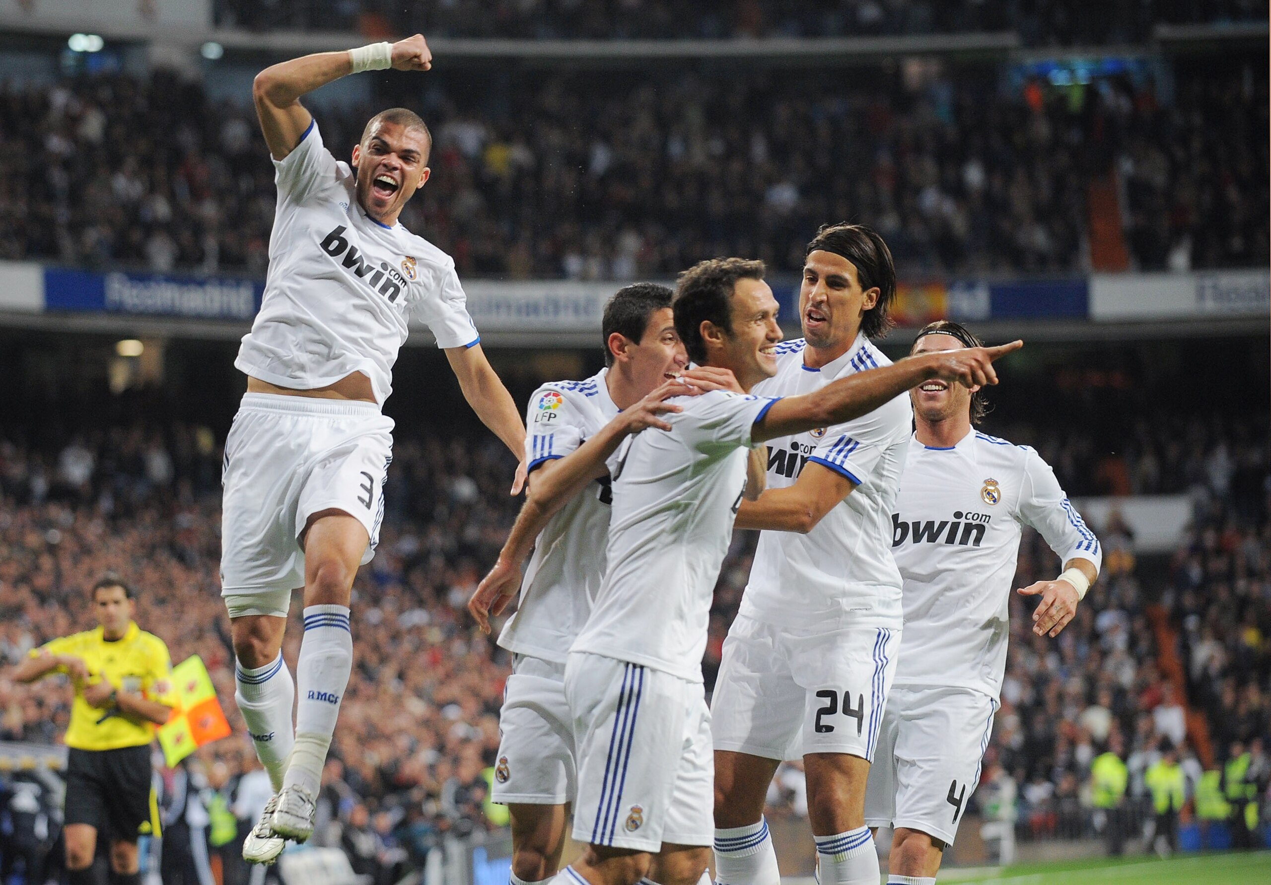 MADRID, SPAIN - NOVEMBER 07: Ricardo Carvalho (C) of Real Madrid celebrates with Pepe (L) and Sami Khedira (#24) after scoring his team's first goal during the La Liga match between Real Madrid and Atletico Madrid at Estadio Santiago Bernabeu on November