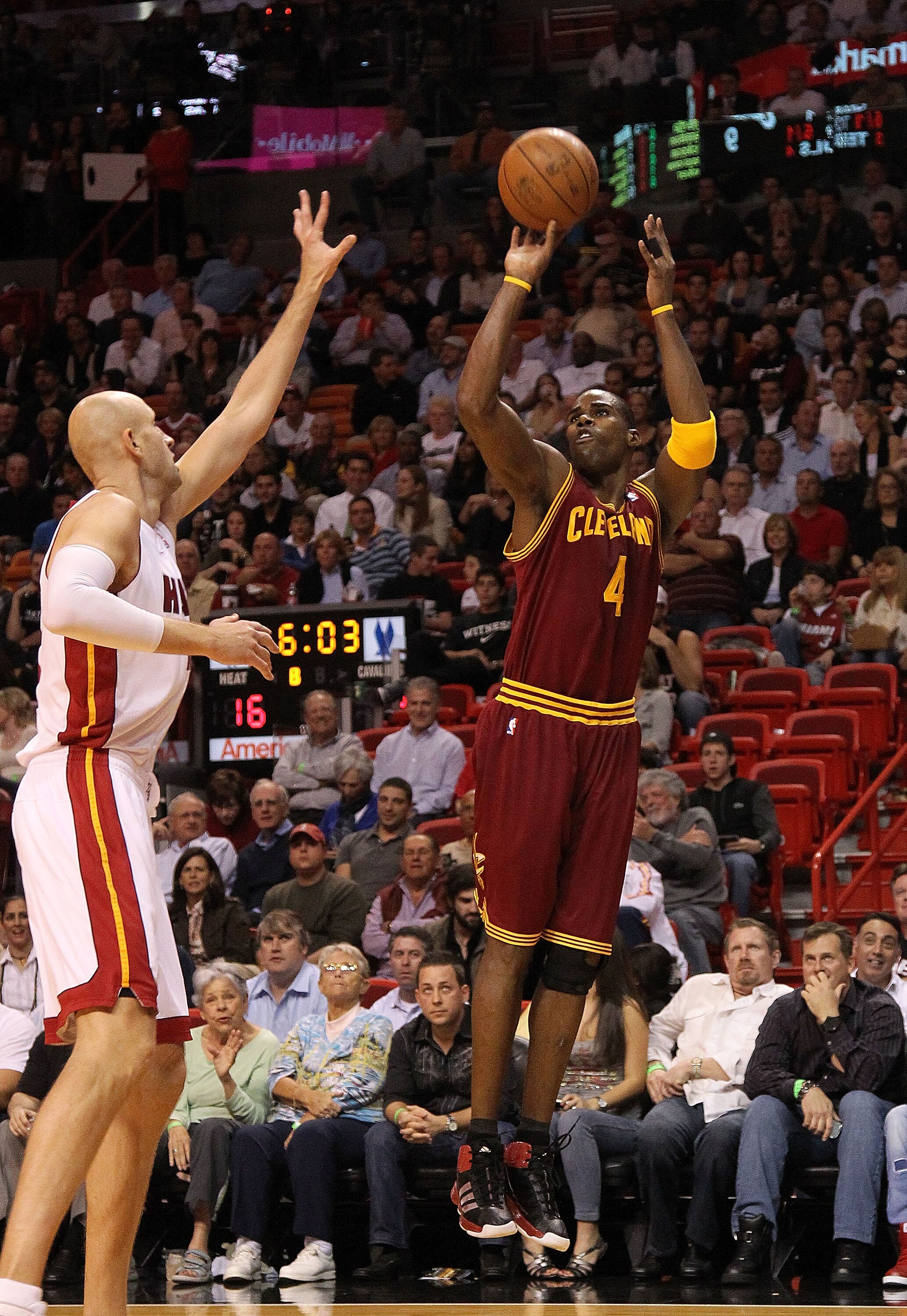 MIAMI, FL - JANUARY 31:  Antawn Jamison #4 of the  Cleveland Cavaliers shoots over Zydrunas Ilgauskas #11 of the Miami Heat during a game against at American Airlines Arena on January 31, 2011 in Miami, Florida. NOTE TO USER: User expressly acknowledges a