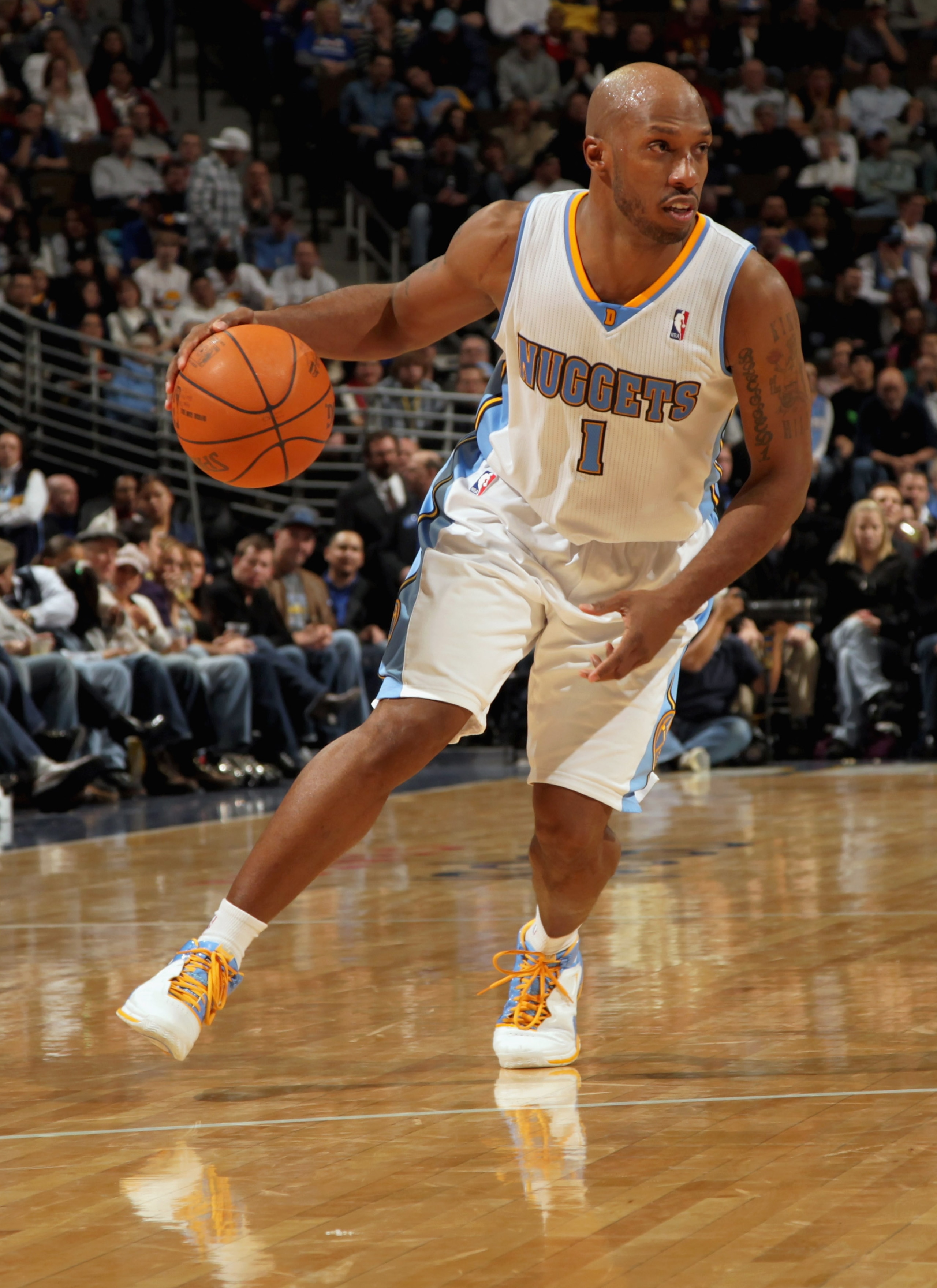 DENVER, CO - FEBRUARY 10: Chauncey Billups #1 of the Denver Nuggets dribbles the ball against the Dallas Mavericks during NBA action at the Pepsi Center on February 10, 2011 in Denver, Colorado. The Nuggets defeated the Mavericks 121-120. NOTE TO USER: U DENVER, CO - FEBRUARY 10: Chauncey Billups #1 of the Denver Nuggets dribbles the ball against the Dallas Mavericks during NBA action at the Pepsi Center on February 10, 2011 in Denver, Colorado. The Nuggets defeated the Mavericks 121-120. NOTE TO USER: U