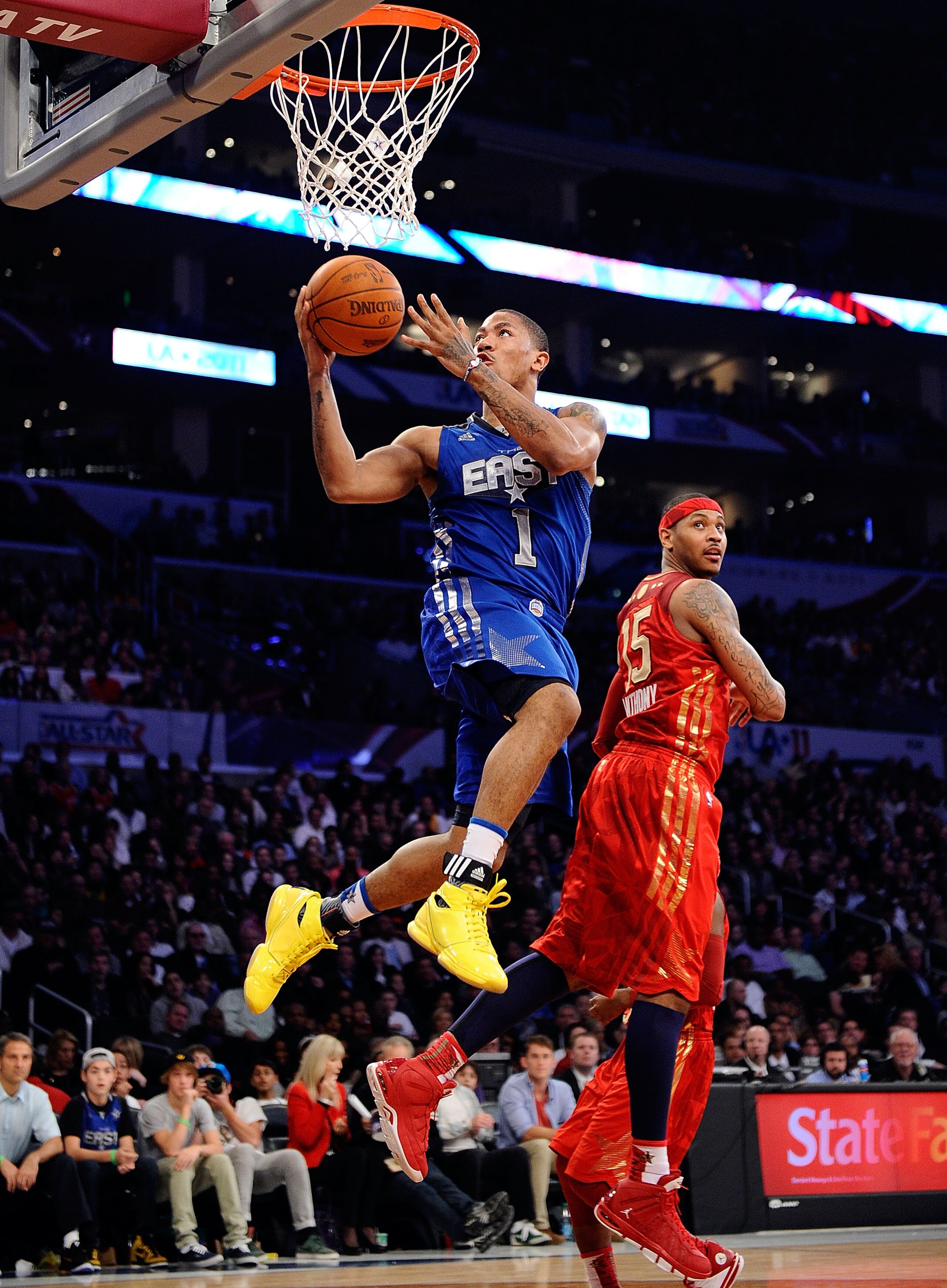 LOS ANGELES, CA - FEBRUARY 20:  Derrick Rose #1 of the Chicago Bulls and the Eastern Conference goes up for a shot past Carmelo Anthony #15 of the Denver Nuggets and the Western Conference in the 2011 NBA All-Star Game at Staples Center on February 20, 20