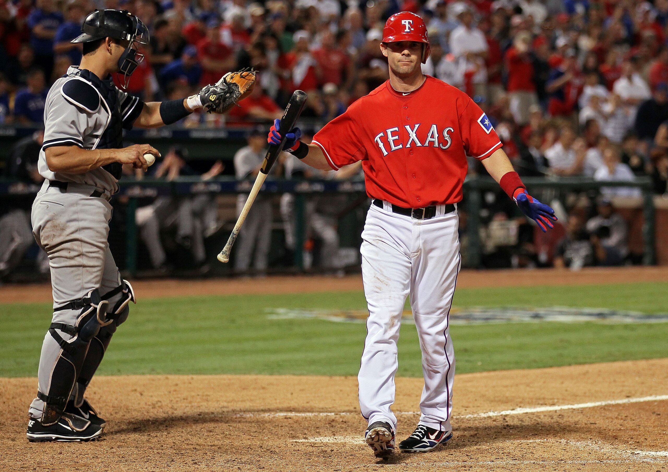 ARLINGTON, TX - OCTOBER 15:  Michael Young #10 of the Texas Rangers reacts after striking out against of the New York Yankees in the ninth inning in Game One of the ALCS during the 2010 MLB Playoffs at Rangers Ballpark in Arlington on October 15, 2010 in