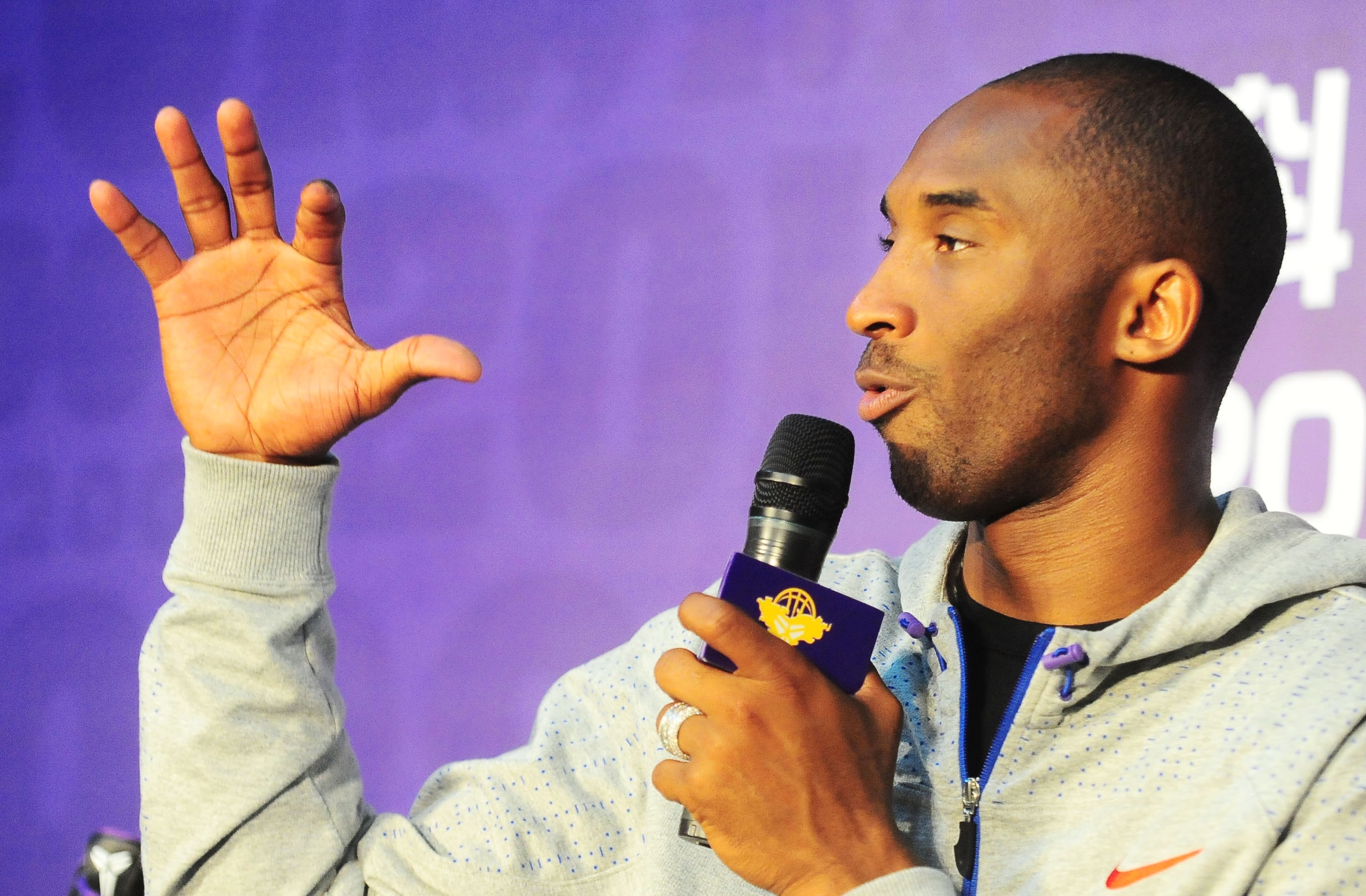 GUANGZHOU, CHINA - JULY 29:  (CHINA OUT) NBA player Kobe Bryant of the Los Angeles Lakers speaks during a meet and greet with fans at Jinan University on July 29, 2010 in Guangzhou, Guangdong Province of China.  (Photo by ChinaFotoPress/Getty Images)