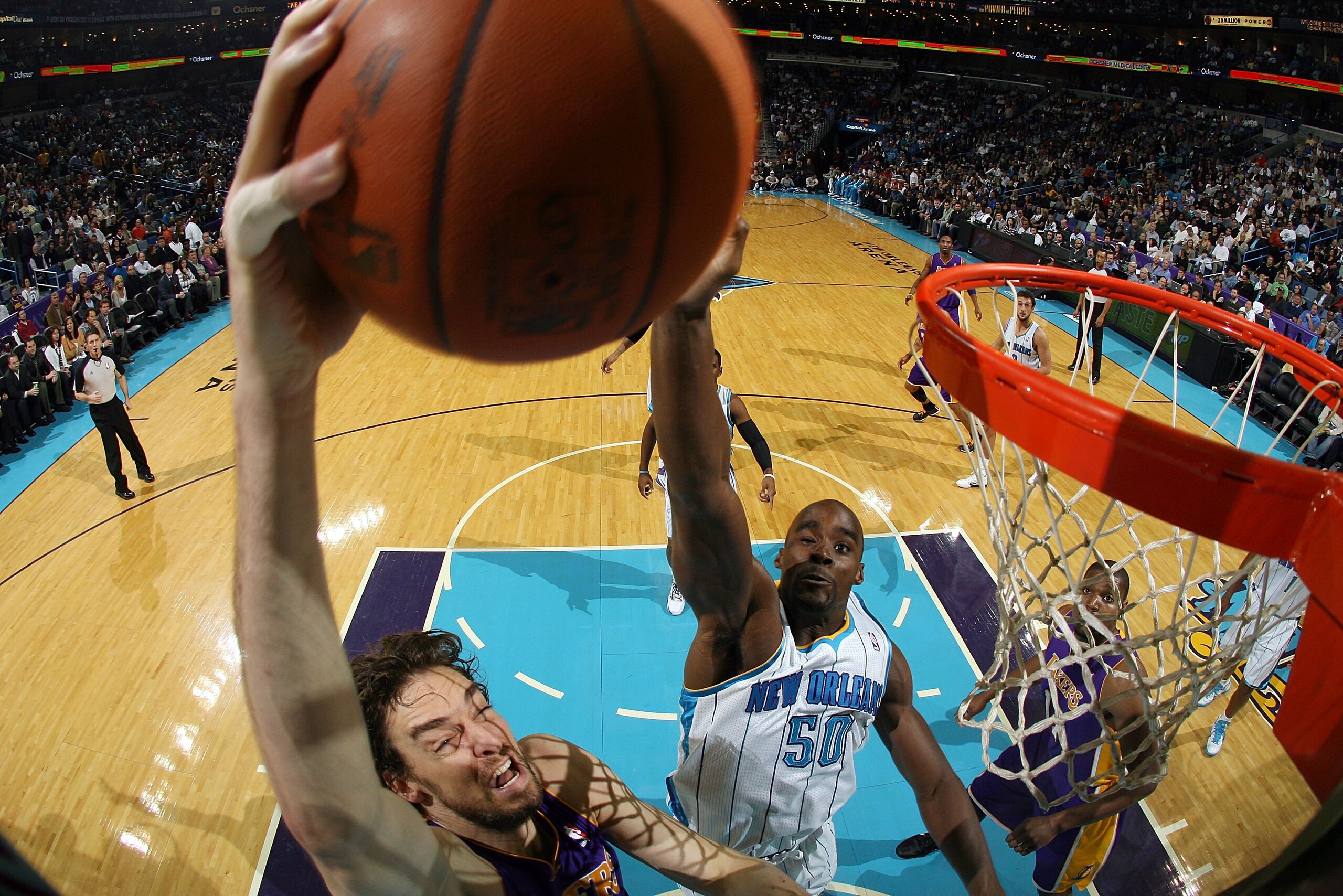 NEW ORLEANS, LA - DECEMBER 29:  Pau Gasol #16 of the Los Angeles Lakers shoots the ball over Emeka Okafor #50 of the New Orleans Hornets at the New Orleans Arena on December 29, 2010 in New Orleans, Louisiana.   The Lakers defeated the Hornets 103-88.  NO