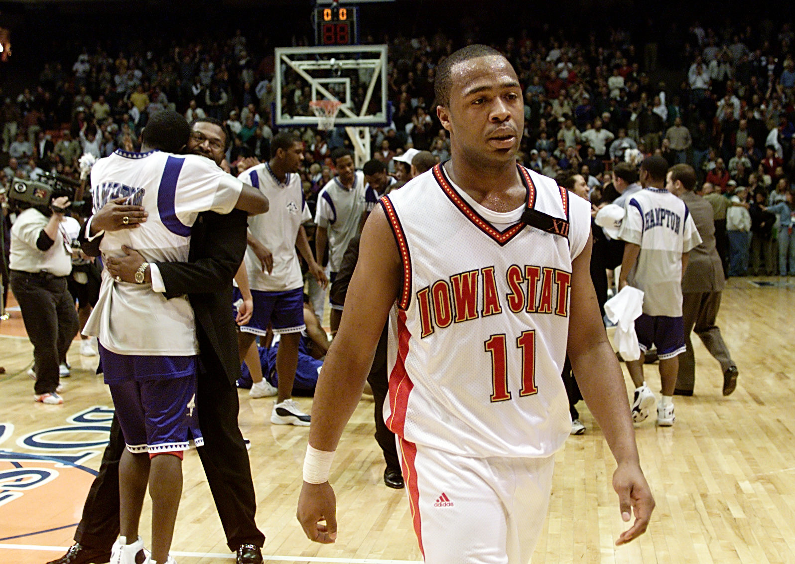 15 Mar 2001:  Jamaal  Tinsley #11 of the Iowa State Cyclones walks off the court after the Hampton Pirates won 58-57 during the first round of the NCAA Tournament at the Boise State University Pavilion in Boise, Idaho.  <DIGITAL IMAGE>  Mandatory Credit:
