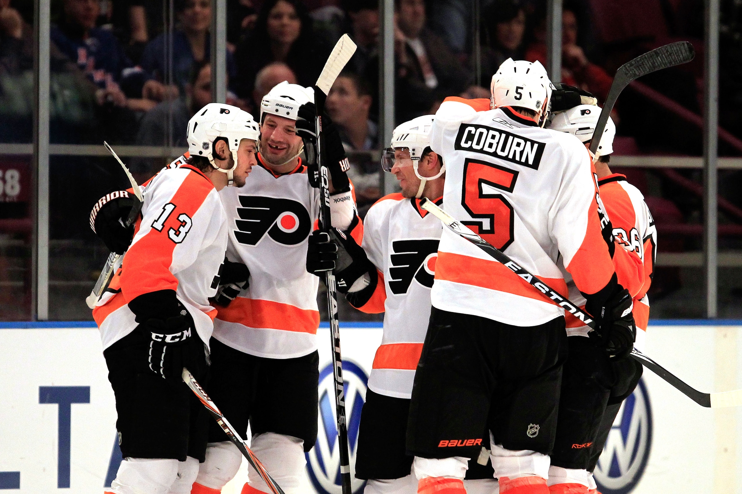 NEW YORK, NY - FEBRUARY 20:  Daniel Carcillo #13 of the Philadelpia Flyers is congratulated by his teammates for his second period goal against the New York Rangers at Madison Square Garden on February 20, 2011 in New York City. The Flyers defeated the Ra
