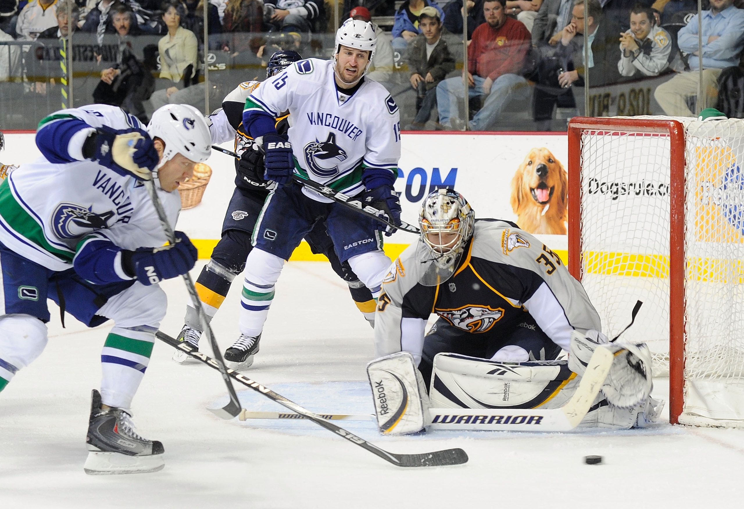 NASHVILLE, TN - FEBRUARY 17:  Pekka Rinne #35 the Nashville Predators makes a save on Raffi Torres #13 of the Vancouver Canucks of  on February 17, 2011 at the Bridgestone Arena in Nashville, Tennessee.  (Photo by Frederick Breedon/Getty Images)