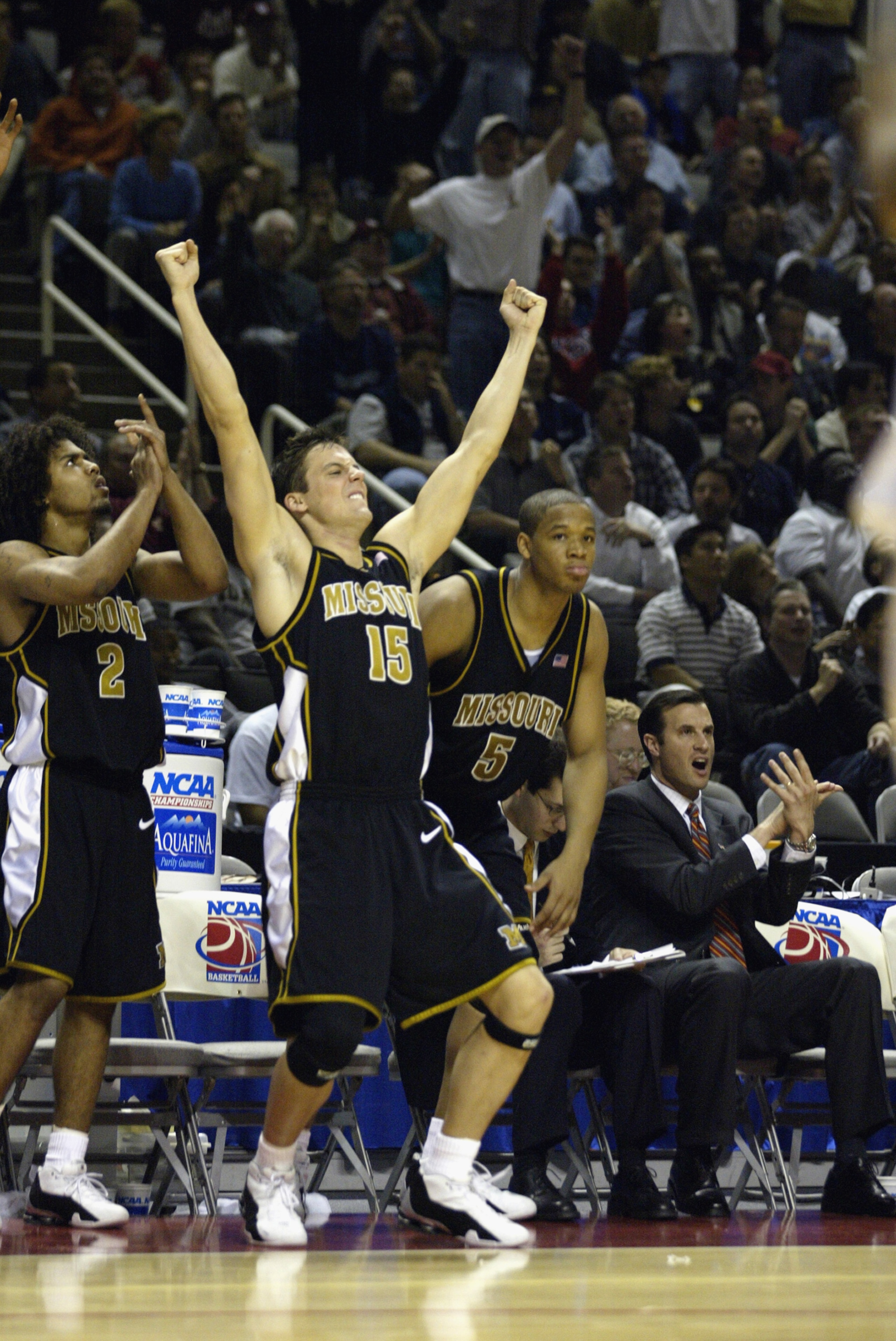 SAN JOSE, CA - MARCH 21:  Josh Kroenke #15 of the Missouri Tigers celebrates the win over the UCLA Bruins during the West Regional Semifinal Game of the 2002 NCAA Basketball Tournament on March 21, 2002 at Compaq Center in San Jose, California.  The Tiger