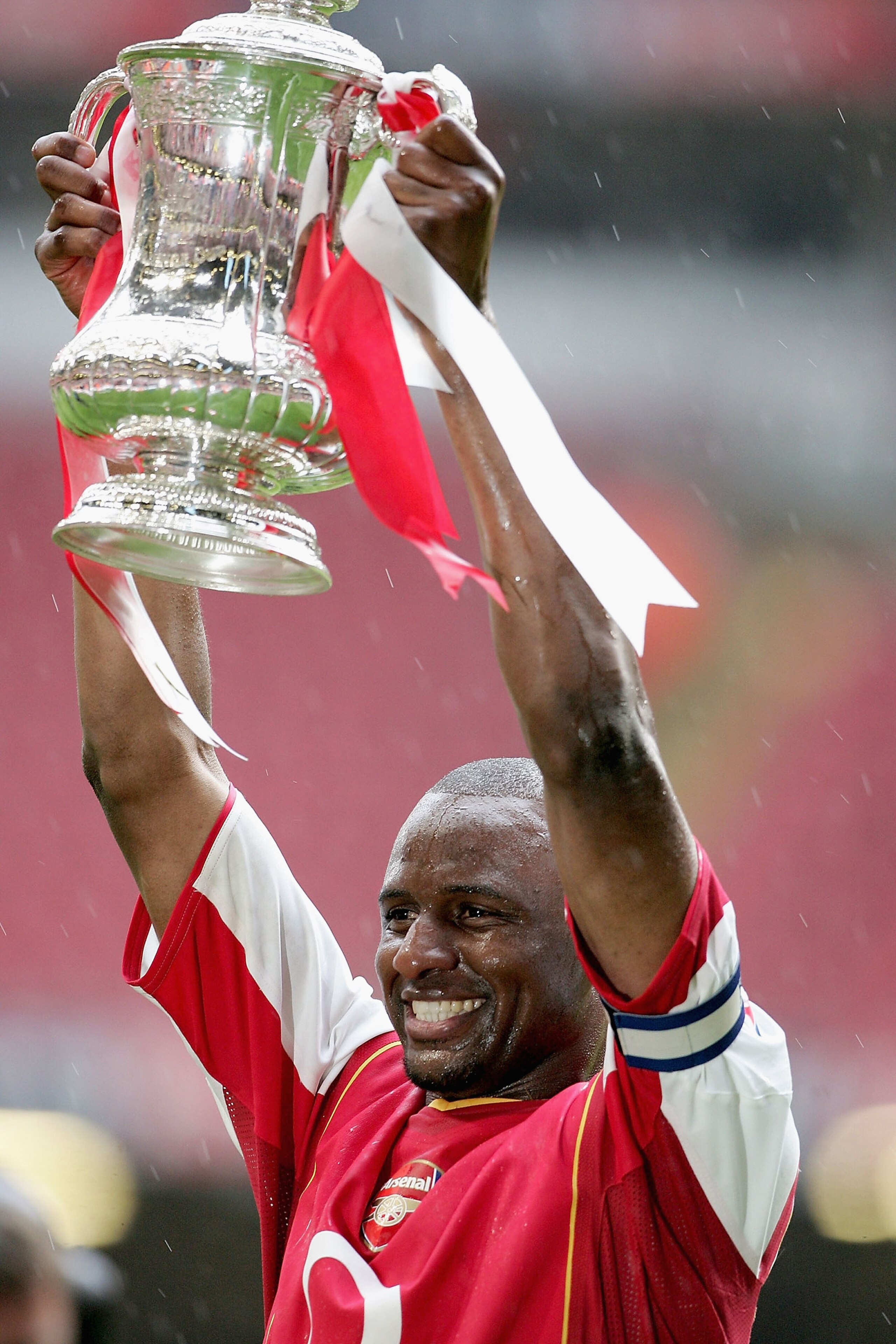 CARDIFF, UNITED KINGDOM - MAY 21:  Captain, Patrick Vieira of Arsenal holds aloft the trophy after winning the FA Cup Final between Arsenal and Manchester United 5-4 on penalty's at The Millennium Stadium on May 21, 2005 in Cardiff, Wales.  (Photo by Phil