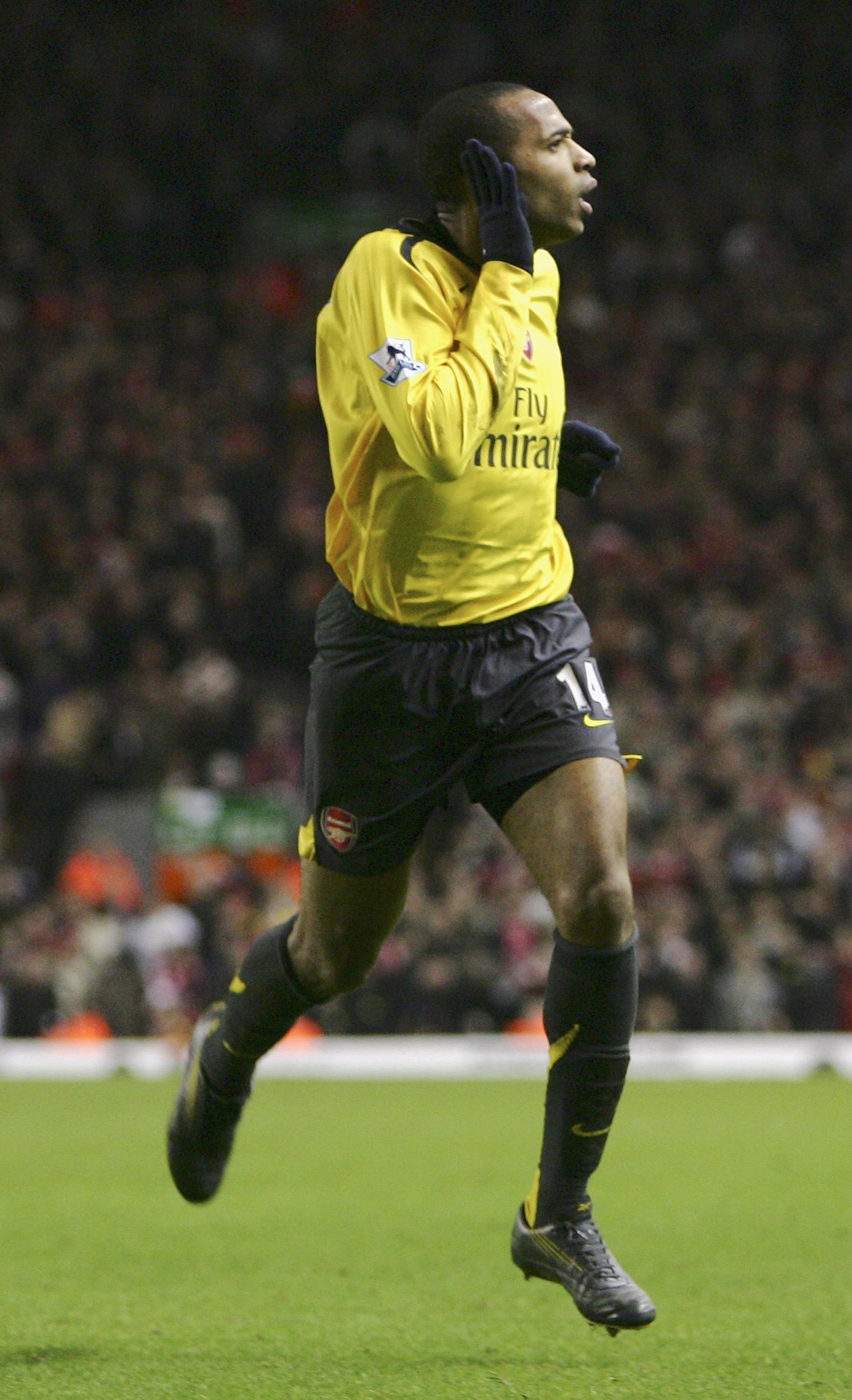 LIVERPOOL, UNITED KINGDOM - JANUARY 06:  Thierry Henry of Arsenal celebrates scoring his team's third goal during the FA Cup sponsored by E.ON Third Round match between Liverpool and Arsenal at Anfield on January 6, 2007 in Liverpool, England.  (Photo by