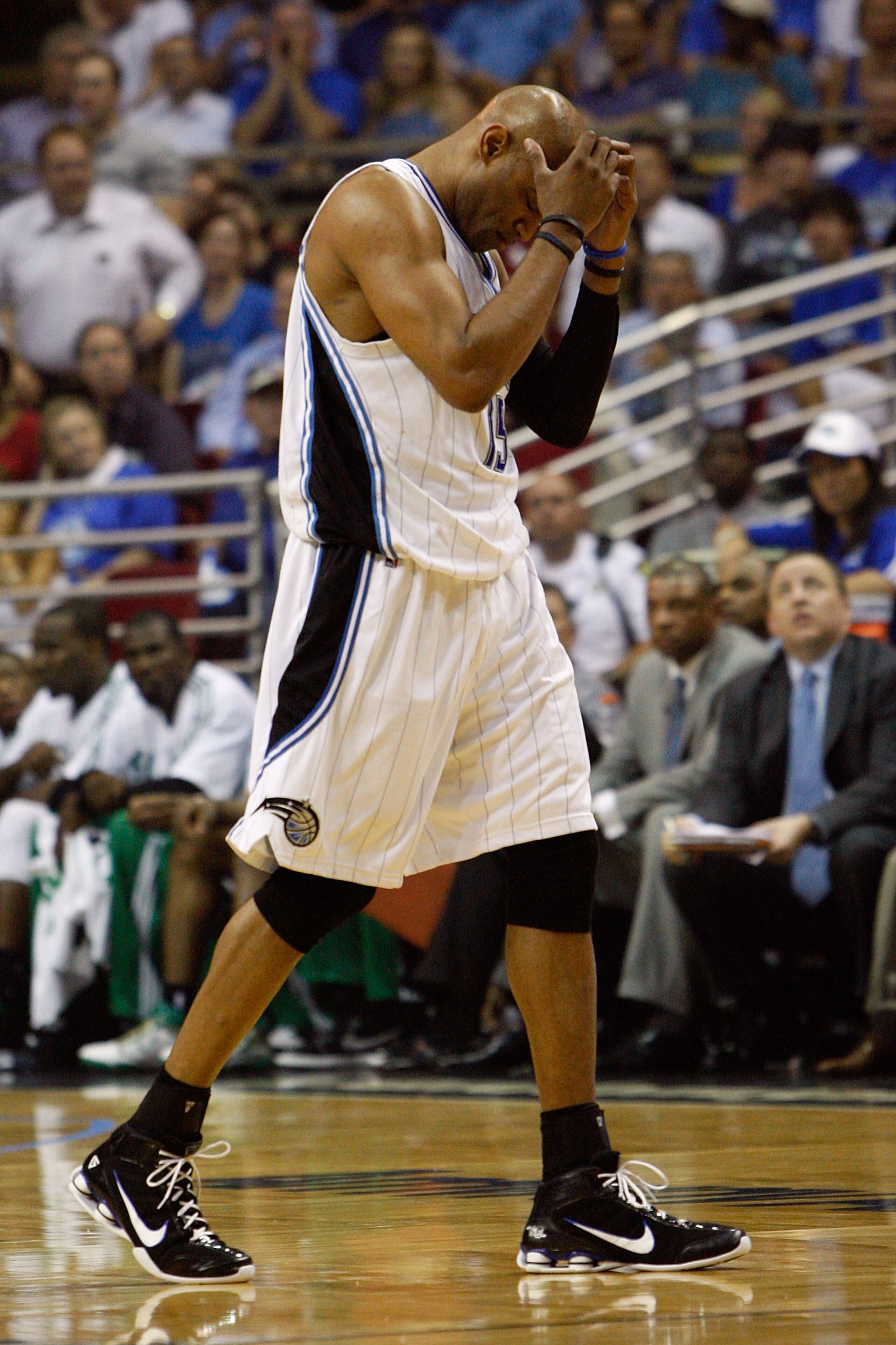 ORLANDO, FL - MAY 18: Vince Carter #15 of the Orlando Magic walks towards the bench with his head down against the Boston Celtics in Game Two of the Eastern Conference Finals during the 2010 NBA Playoffs at Amway Arena on May 18, 2010 in Orlando, Florida ORLANDO, FL - MAY 18: Vince Carter #15 of the Orlando Magic walks towards the bench with his head down against the Boston Celtics in Game Two of the Eastern Conference Finals during the 2010 NBA Playoffs at Amway Arena on May 18, 2010 in Orlando, Florida