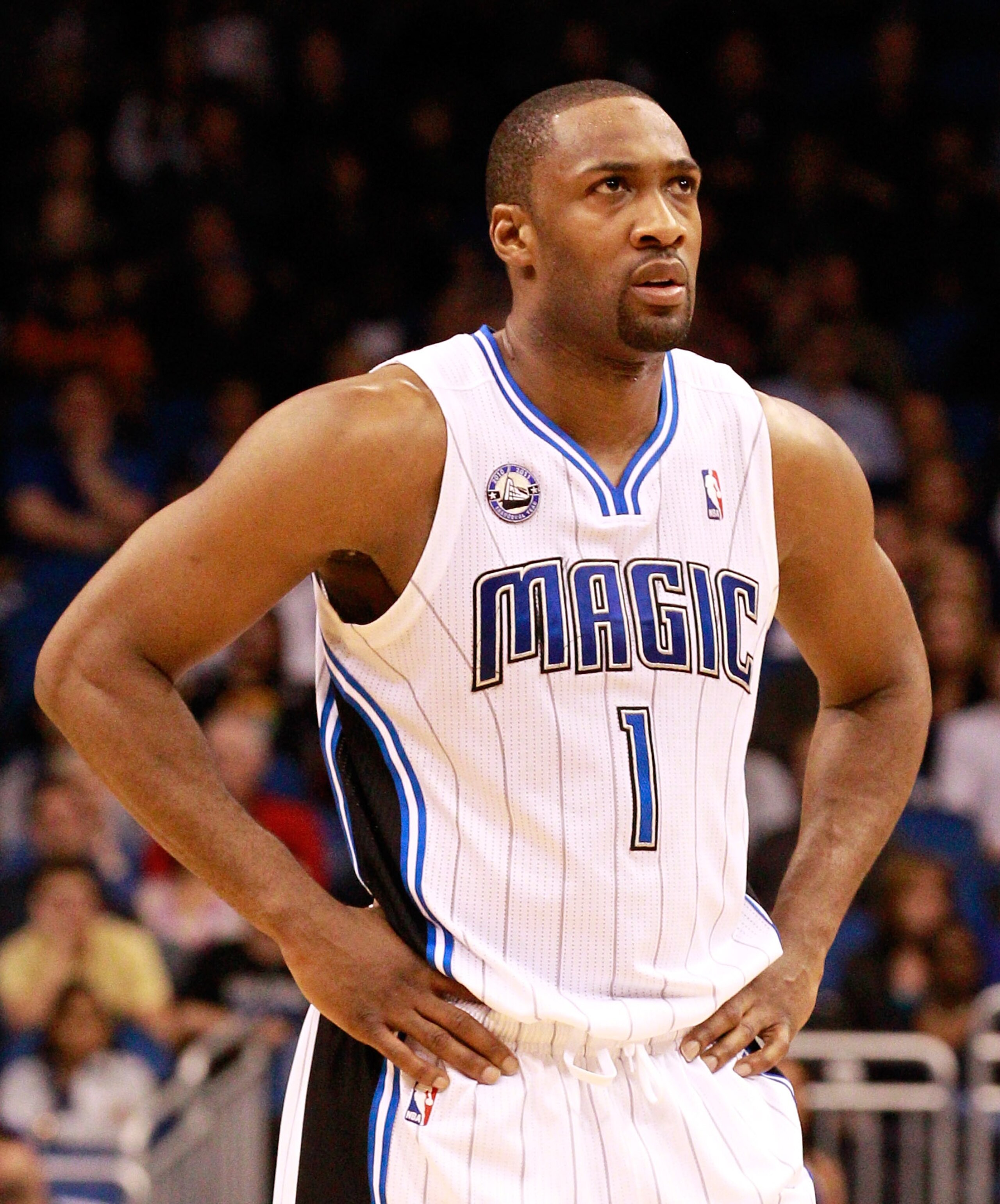 ORLANDO, FL - JANUARY 24: Gilbert Arenas #1 of the Orlando Magic looks at the scoreboard during the game against the Detroit Pistons at Amway Arena on January 24, 2011 in Orlando, Florida. NOTE TO USER: User expressly acknowledges and agrees that, by do ORLANDO, FL - JANUARY 24: Gilbert Arenas #1 of the Orlando Magic looks at the scoreboard during the game against the Detroit Pistons at Amway Arena on January 24, 2011 in Orlando, Florida. NOTE TO USER: User expressly acknowledges and agrees that, by do