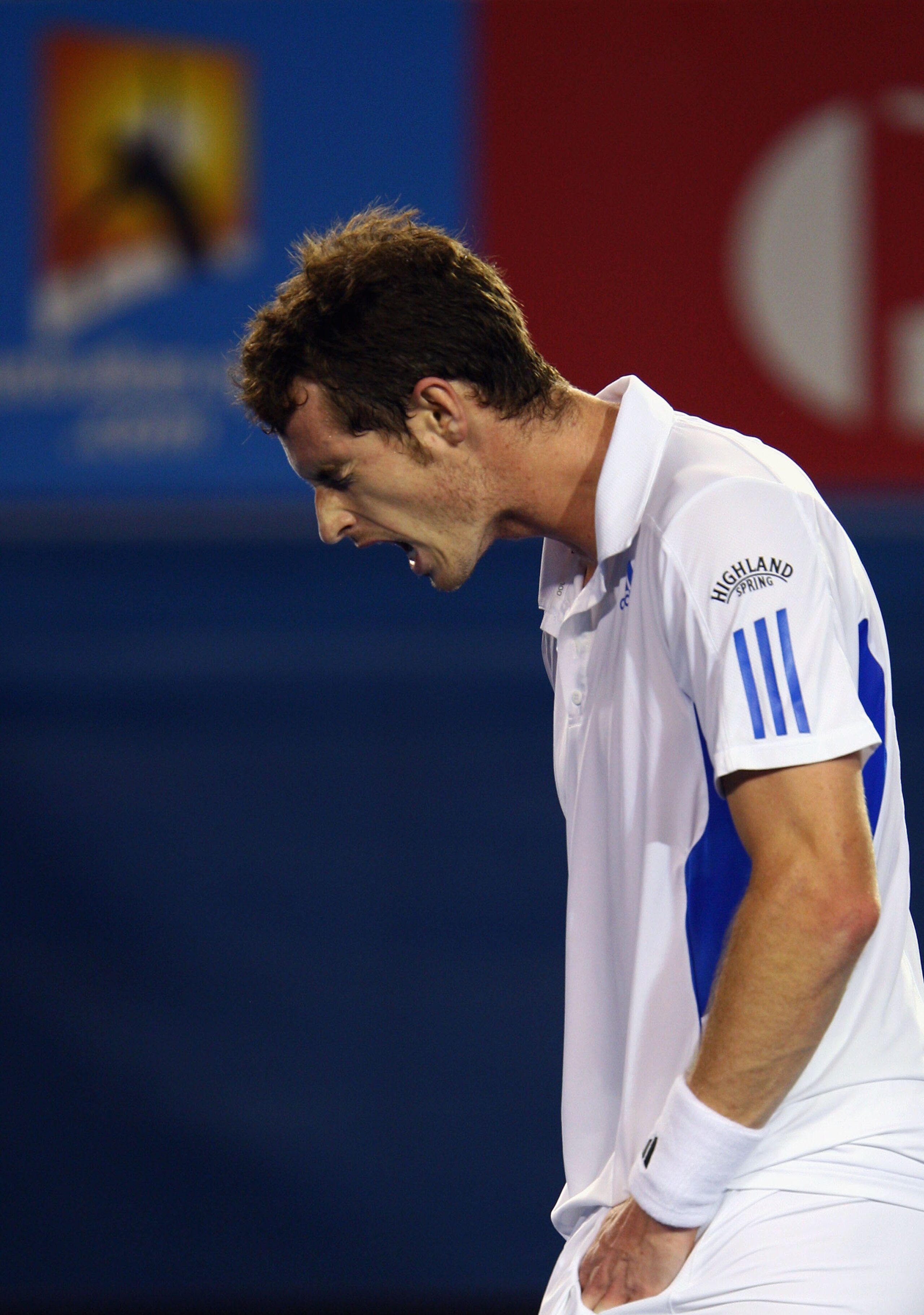 MELBOURNE, AUSTRALIA - JANUARY 31:  Andy Murray of Great Britain reacts after a point in his men's final match against Roger Federer of Switzerland during day fourteen of the 2010 Australian Open at Melbourne Park on January 31, 2010 in Melbourne, Austral