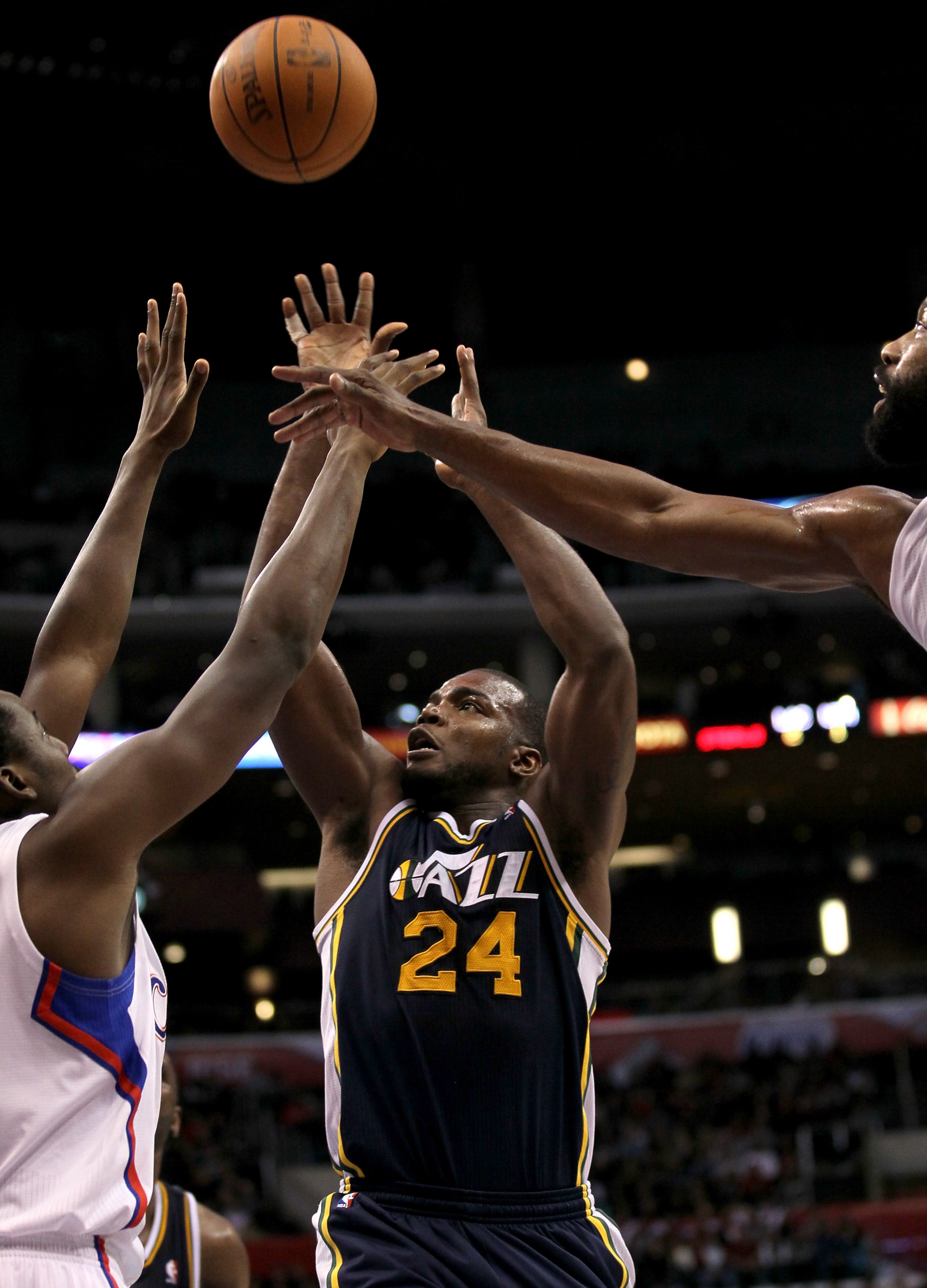 LOS ANGELES, CA - DECEMBER 29: Paul Millsap #24 of the Utah Jazz shoots against the Los Angeles Clippers at Staples Center on December 29, 2010 in Los Angeles, California. The Jazz won 103-85. NOTE TO USER: User expressly acknowledges and agrees that, LOS ANGELES, CA - DECEMBER 29: Paul Millsap #24 of the Utah Jazz shoots against the Los Angeles Clippers at Staples Center on December 29, 2010 in Los Angeles, California. The Jazz won 103-85. NOTE TO USER: User expressly acknowledges and agrees that,