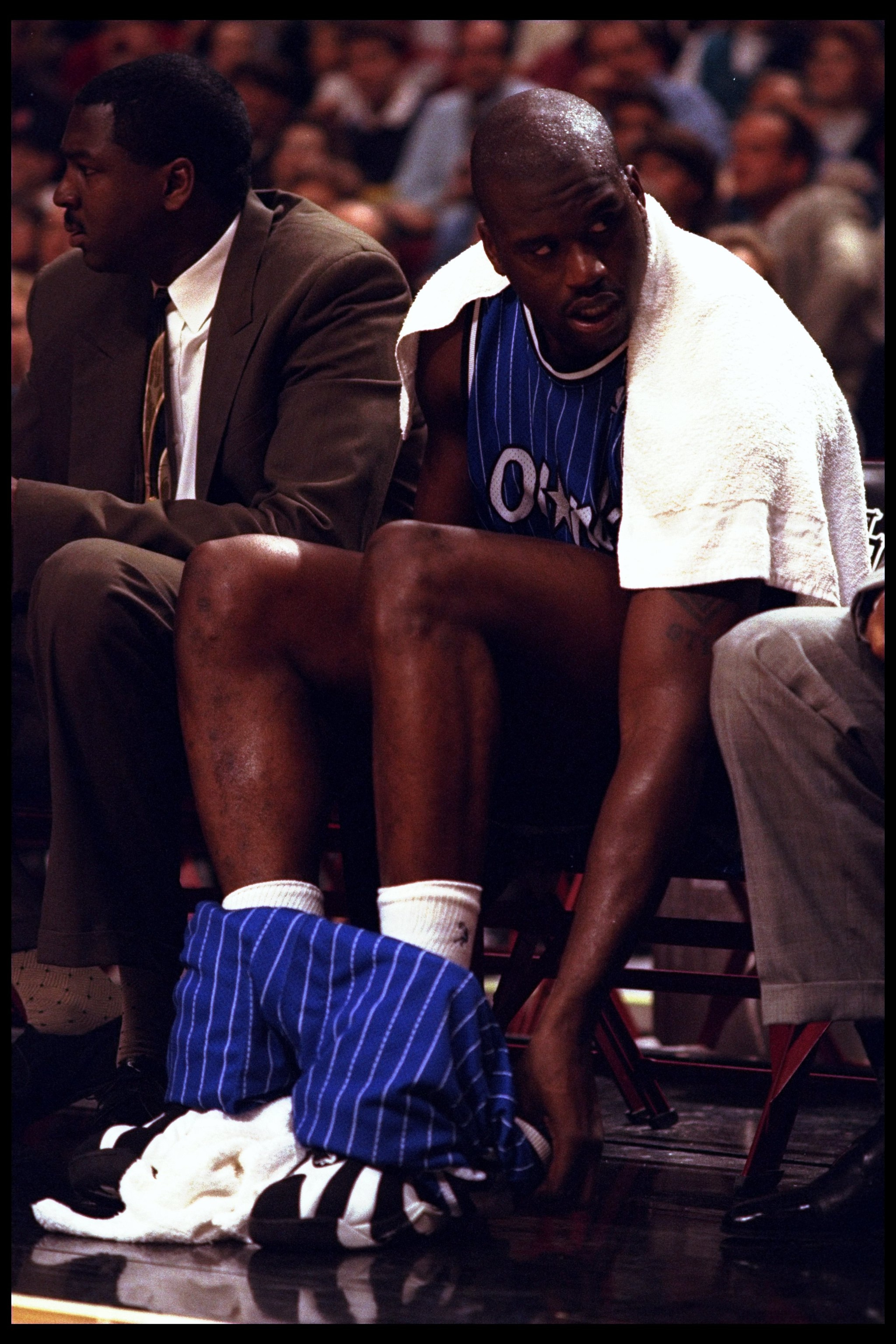 25 Feb 1996: Center Shaquille O'Neal of the Orlando Magic on the bench during a game against the Chicago Bulls played at the United Center in Chicago, Ilinois. The Bulls won the game, 111-91. 25 Feb 1996: Center Shaquille O'Neal of the Orlando Magic on the bench during a game against the Chicago Bulls played at the United Center in Chicago, Ilinois. The Bulls won the game, 111-91.