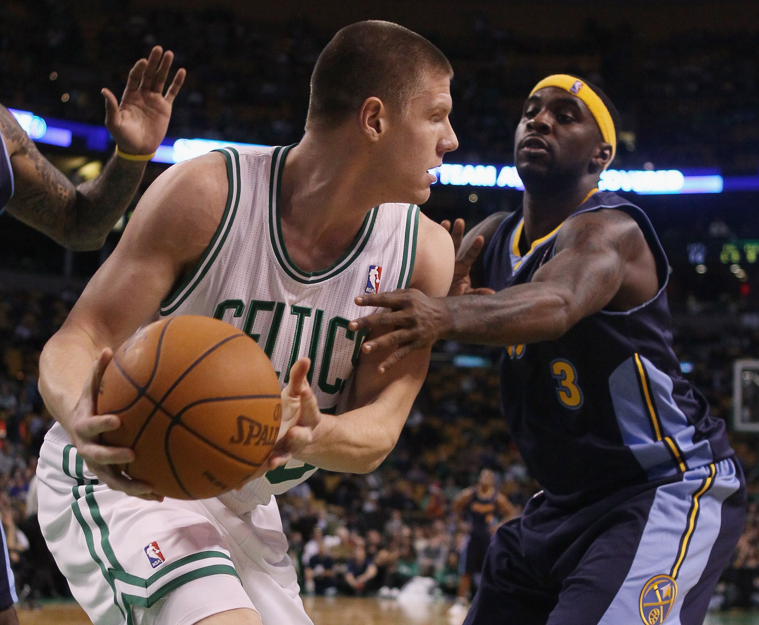 BOSTON, MA - DECEMBER 08: Luke Harangody #55 of the Boston Celtics tries to get around Ty Lawson #3 of the Denver Nuggets on December 8, 2010 at the TD Garden in Boston, Massachusetts. The Celtics defeated the Nuggets 105-89. NOTE TO USER: User expressly