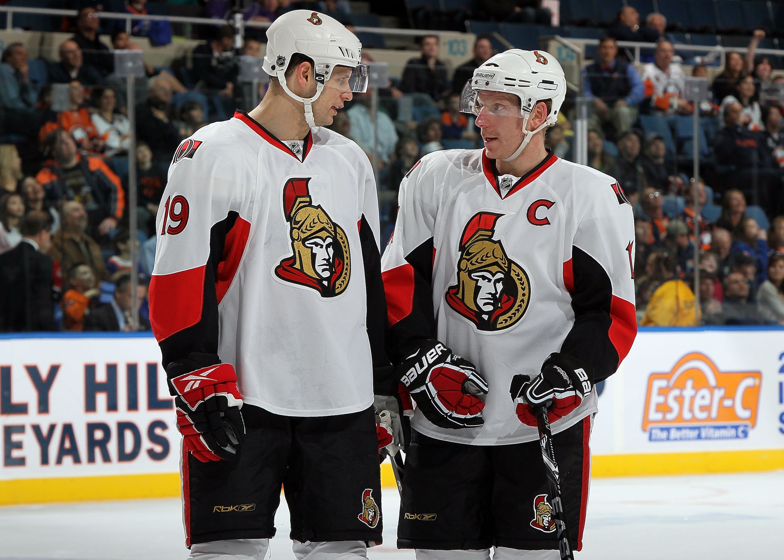 UNIONDALE, NY - APRIL 03:  Daniel Alfredsson #11 of the Ottawa Senators talks with teammate Jason Spezza #19 during a timeout against the New York Islanders on April 3, 2010 at Nassau Coliseum in Uniondale, New York.  (Photo by Jim McIsaac/Getty Images)