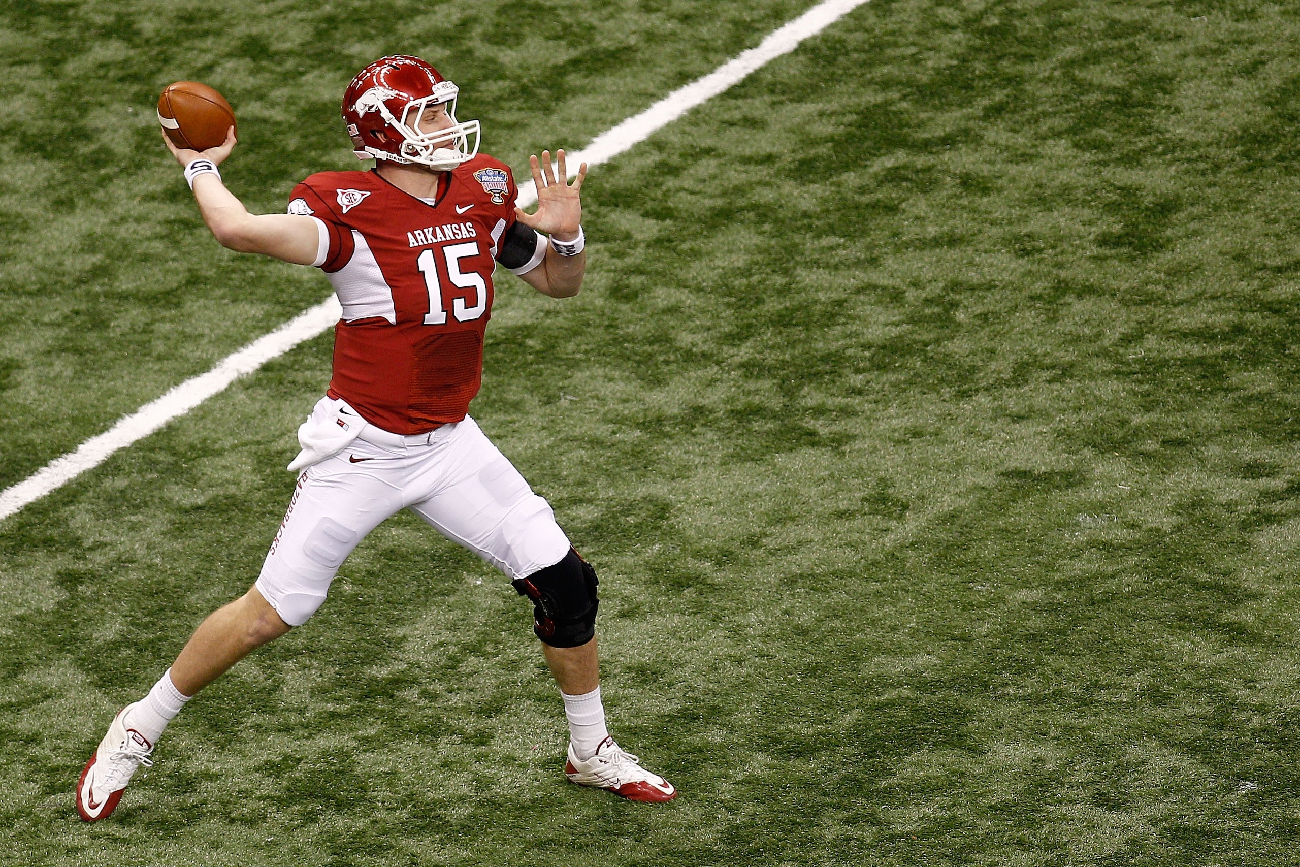NEW ORLEANS, LA - JANUARY 04:  Ryan Mallett #15 of the Arkansas Razorbacks looks to pass in the first half against the Ohio State Buckeyes during the Allstate Sugar Bowl at the Louisiana Superdome on January 4, 2011 in New Orleans, Louisiana.  (Photo by C