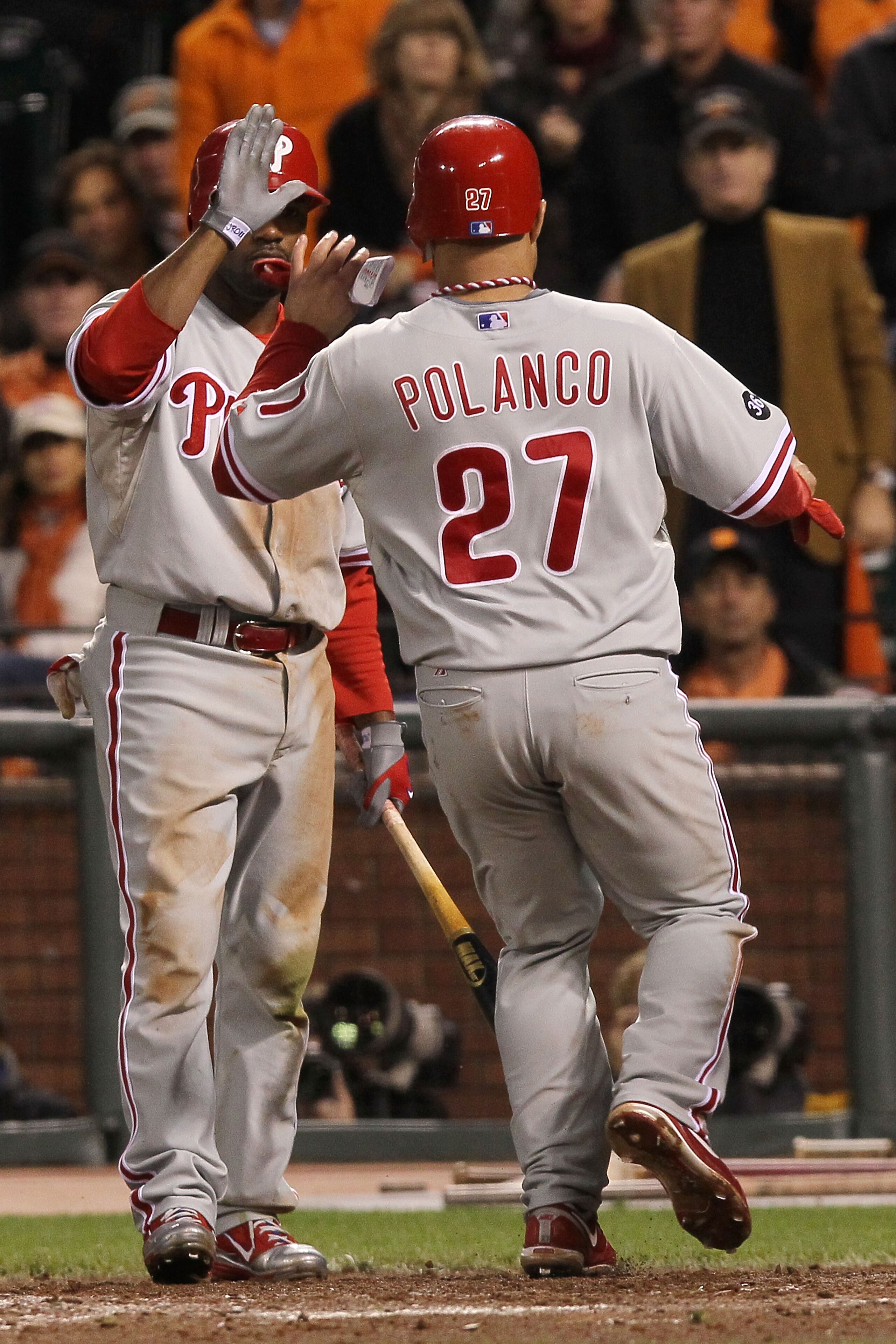 SAN FRANCISCO - OCTOBER 20:  Placido Polanco #27 of the Philadelphia Phillies scores against the San Francisco Giants in the fifth inning of Game Four of the NLCS during the 2010 MLB Playoffs at AT&T Park on October 20, 2010 in San Francisco, California.
