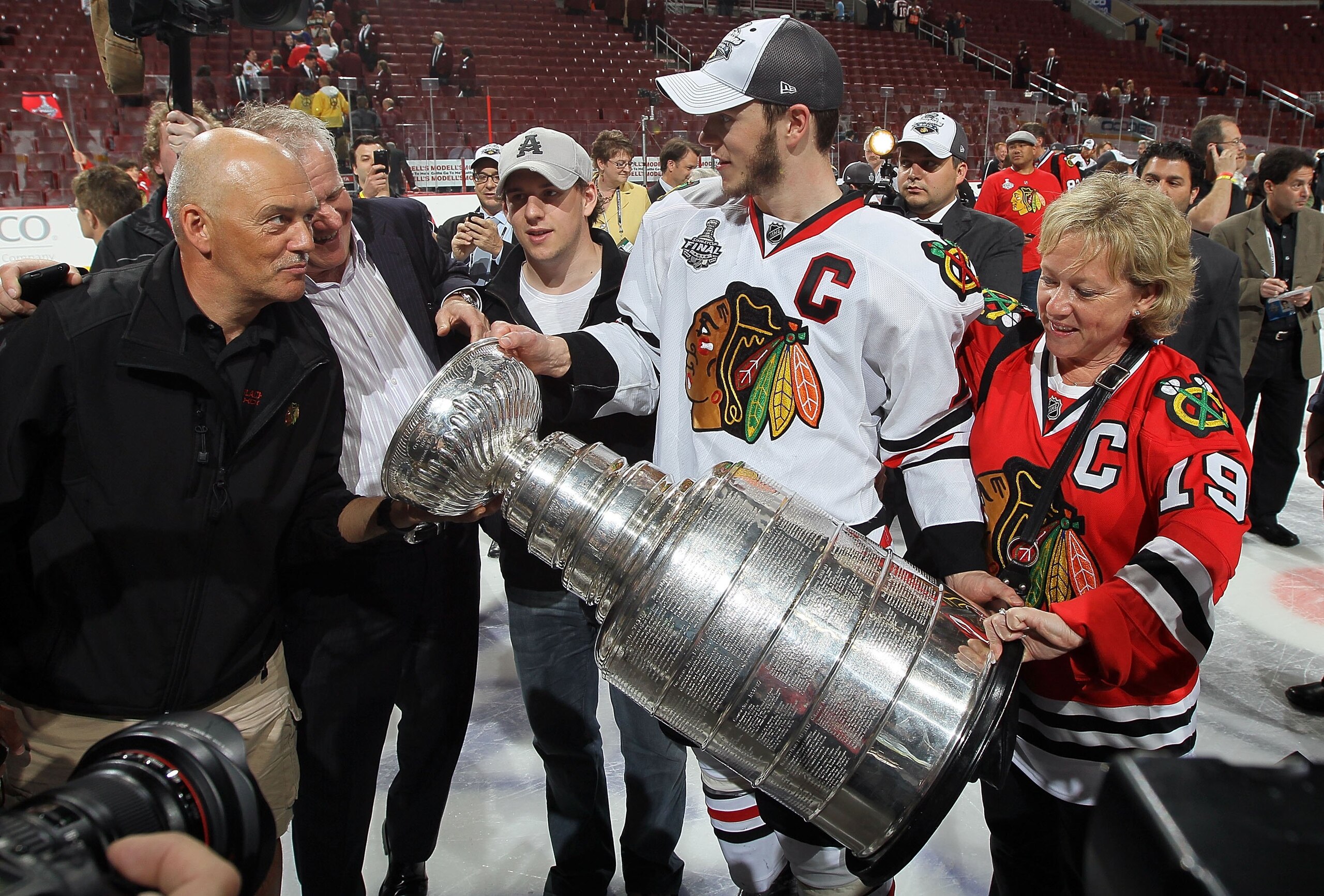 PHILADELPHIA - JUNE 09:  Jonathan Toews #19 of the Chicago Blackhawks hoists the Stanley Cup after teammate Patrick Kane scored the game-winning goal in overtime to defeat the Philadelphia Flyers 4-3 and win the Stanley Cup in Game Six of the 2010 NHL Sta