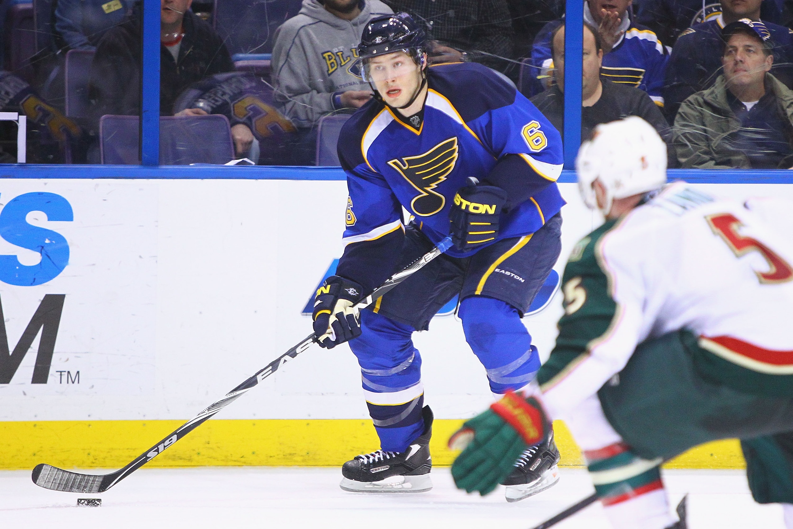 ST. LOUIS, MO - FEBRUARY 11: Erik Johnson #6 of the St. Louis Blues moves the puck up the ice against the Minnesota Wild at the Scottrade Center on February 11, 2011 in St. Louis, Missouri.  The Wild won 5-4 in a shootout.  (Photo by Dilip Vishwanat/Getty