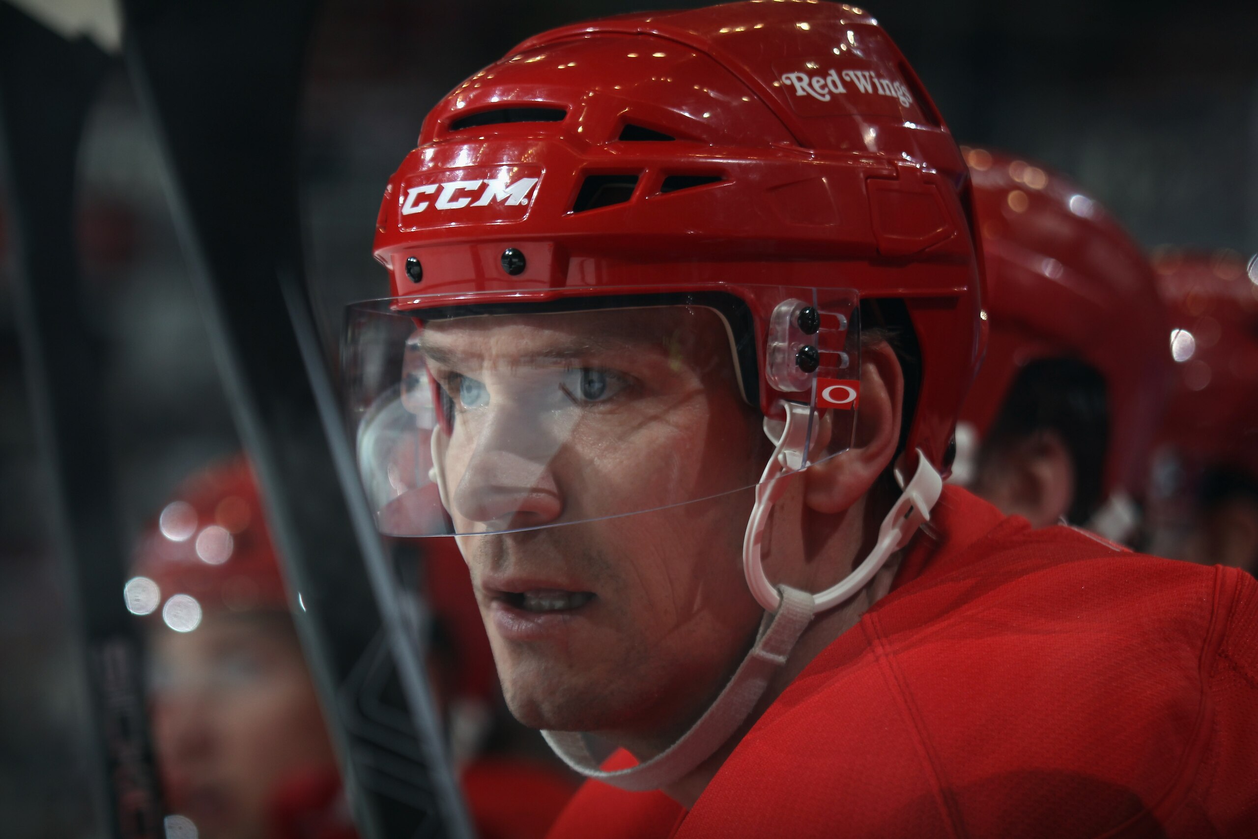 DETROIT, MI - DECEMBER 08:  Nicklas Lidstrom #5 of the Detroit Red Wings watches the game from the bench against the Nashville Predators at the Joe Louis Arena on December 8, 2010 in Detroit, Michigan. The Predators defeated the Red Wings 3-2.  (Photo by