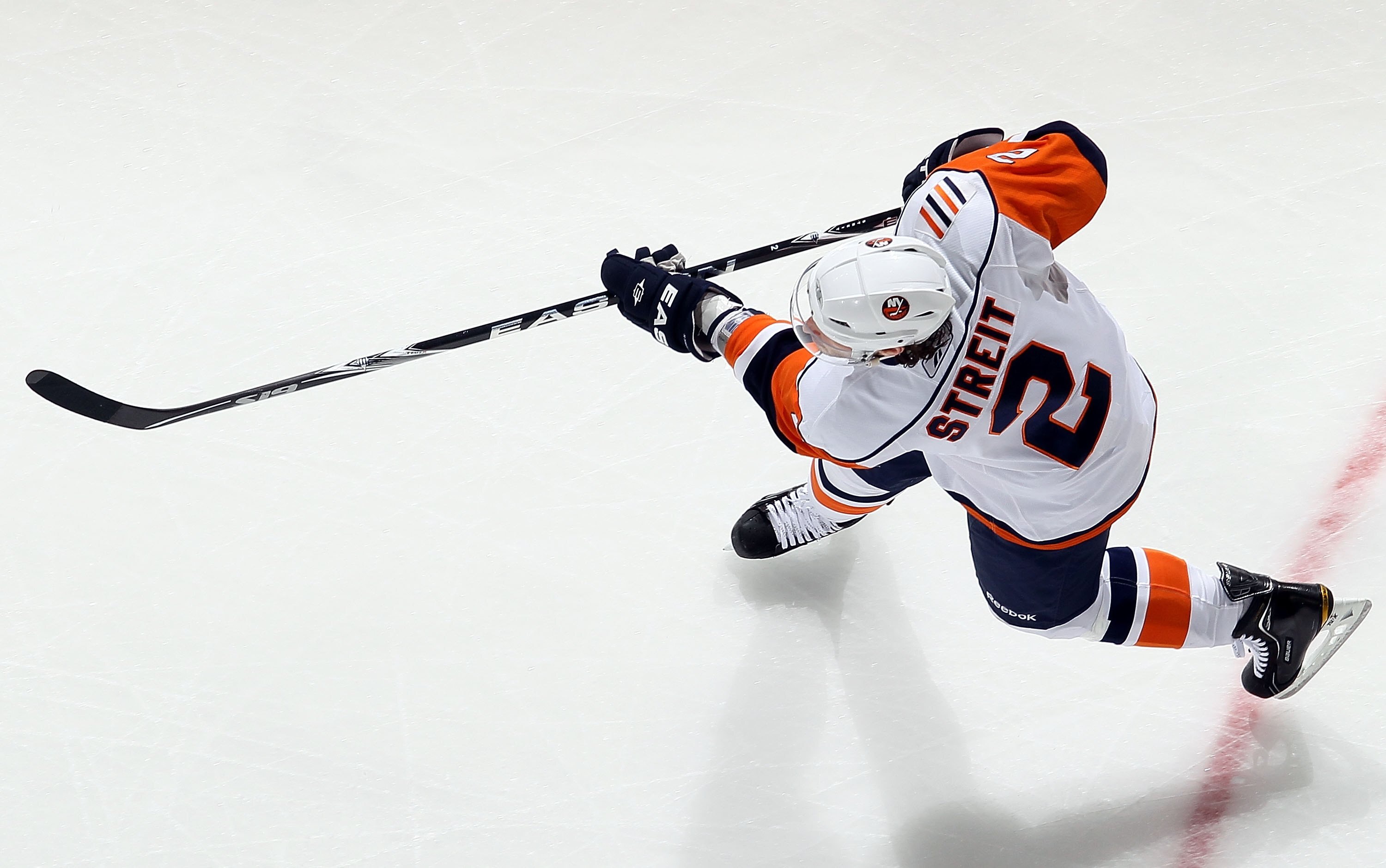 NEWARK, NJ - APRIL 10:  Mark Streit #2 of the New York Islanders skates against the New Jersey Devils at the Prudential Center on April 10, 2010 in Newark, New Jersey.  (Photo by Jim McIsaac/Getty Images)