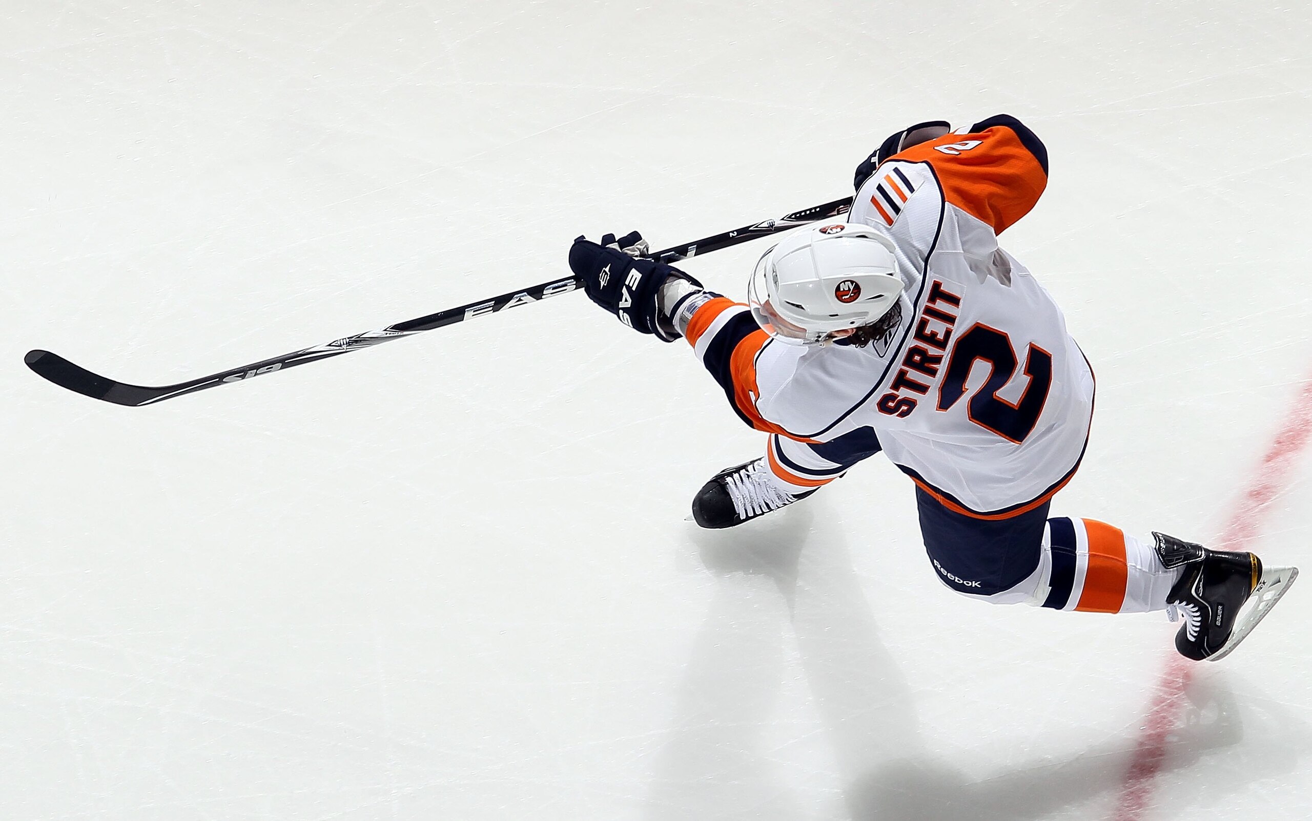 NEWARK, NJ - APRIL 10:  Mark Streit #2 of the New York Islanders skates against the New Jersey Devils at the Prudential Center on April 10, 2010 in Newark, New Jersey.  (Photo by Jim McIsaac/Getty Images)