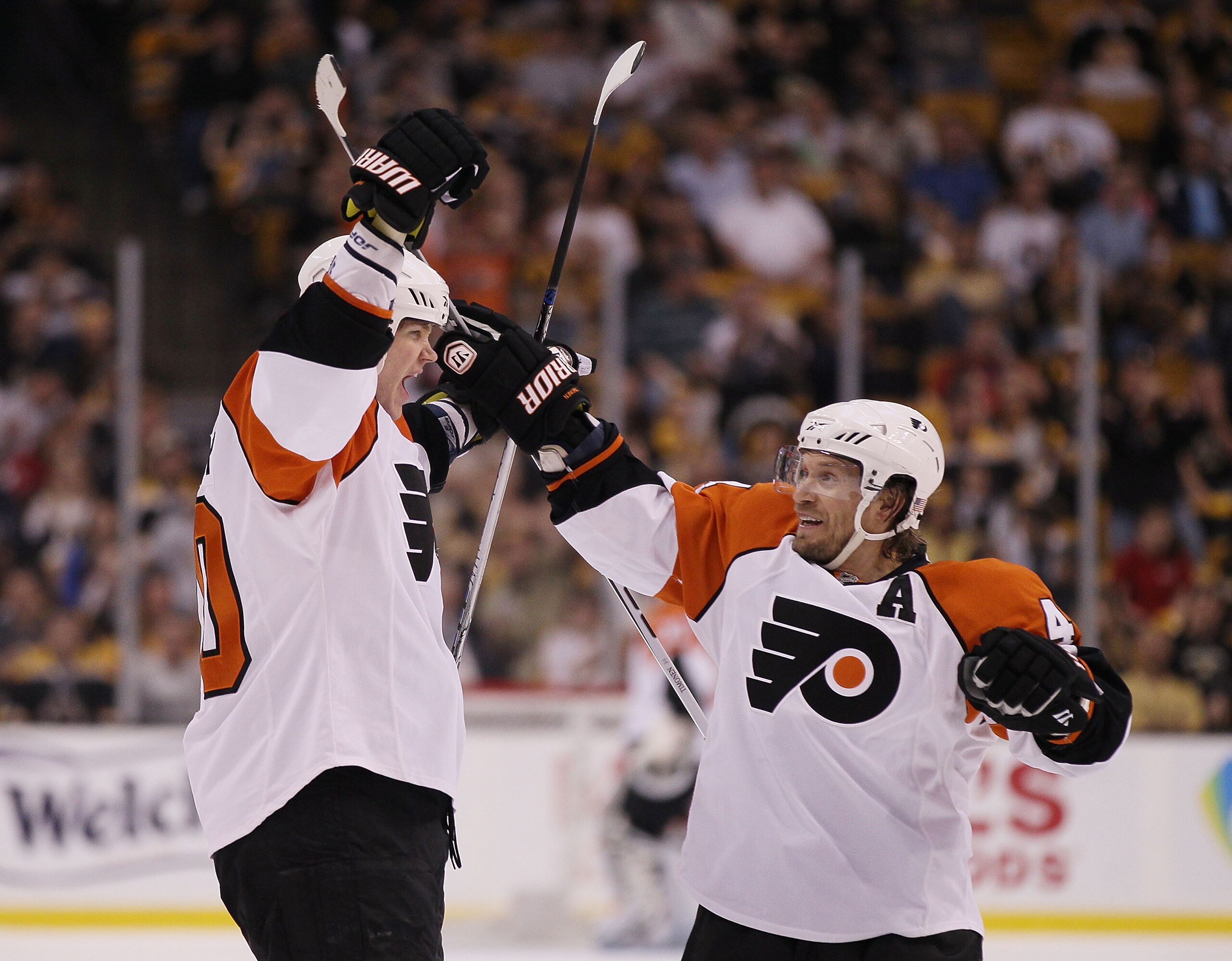 BOSTON - MAY 01:  Chris Pronger #20 of the Philadelphia Flyers celebrates his goal with teammate Kimmo Timonen #44 in the second period against the Boston Bruins in Game One of the Eastern Conference Semifinals during the 2010 NHL Stanley Cup Playoffs at