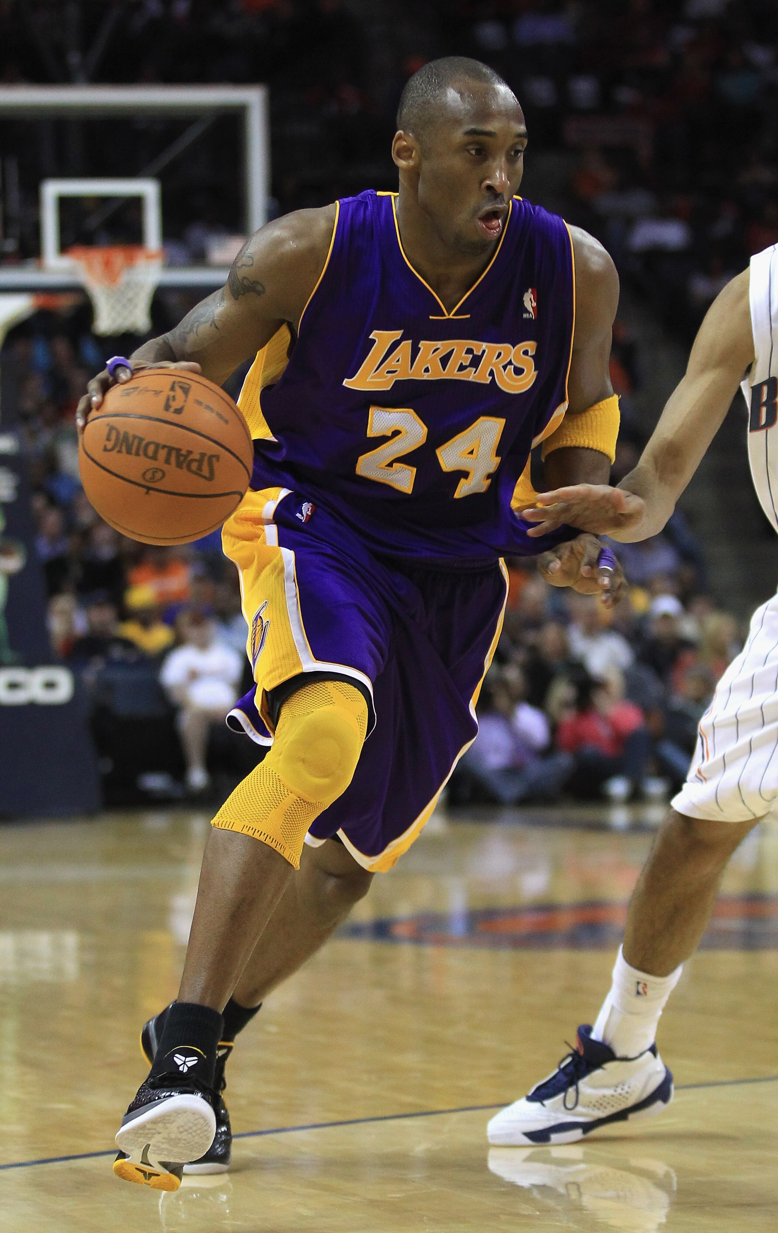 CHARLOTTE, NC - FEBRUARY 14:  Kobe Bryant #24 of the Los Angeles Lakers against the Charlotte Bobcats during their game at Time Warner Cable Arena on February 14, 2011 in Charlotte, North Carolina. NOTE TO USER: User expressly acknowledges and agrees that