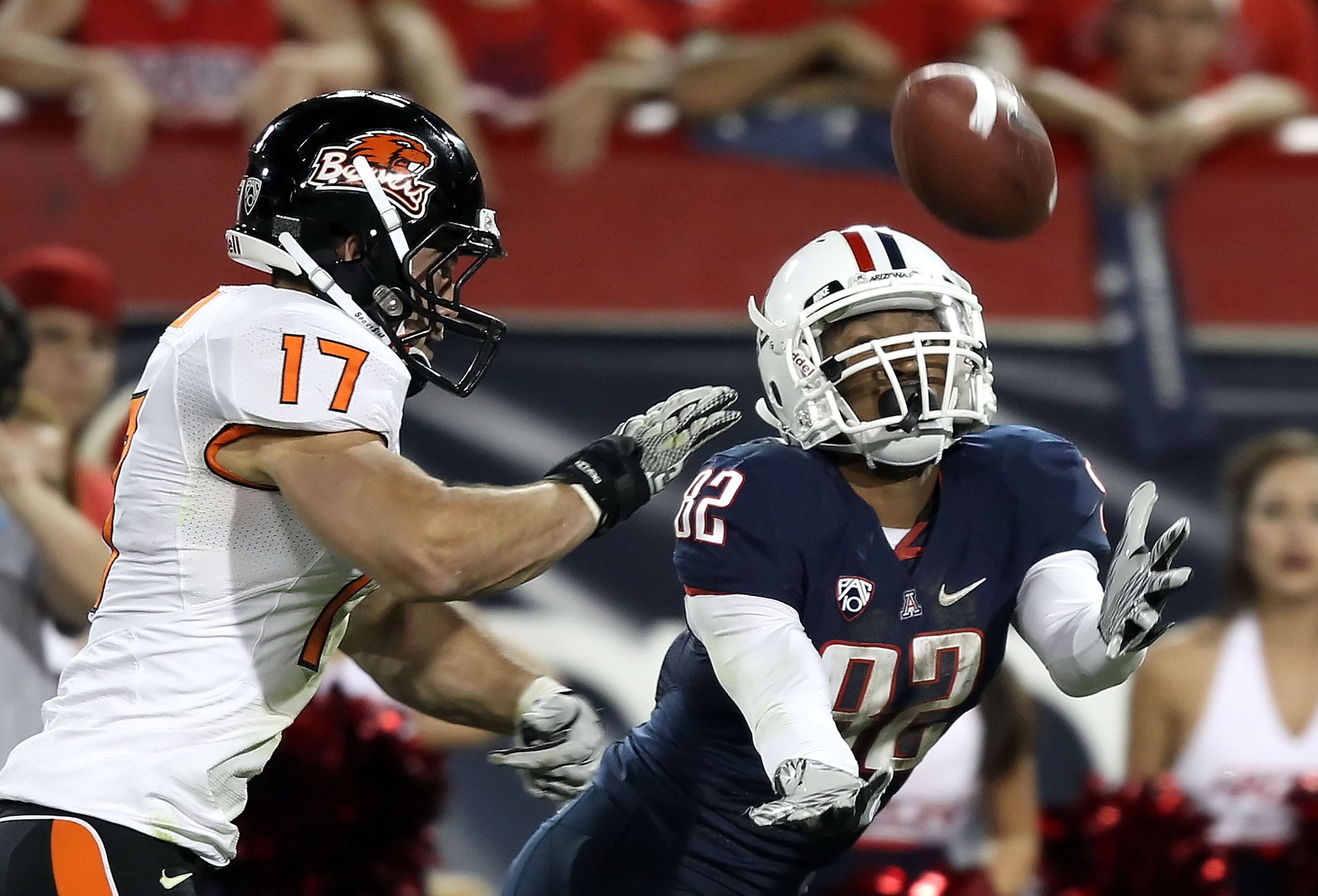 TUCSON, AZ - OCTOBER 09:  Wide receiver Juron Criner #82 of the Arizona Wildcats attempts to catch a pass during the fourth quarter of the college football game against the Oregon State Beavers at Arizona Stadium on October 9, 2010 in Tucson, Arizona. The
