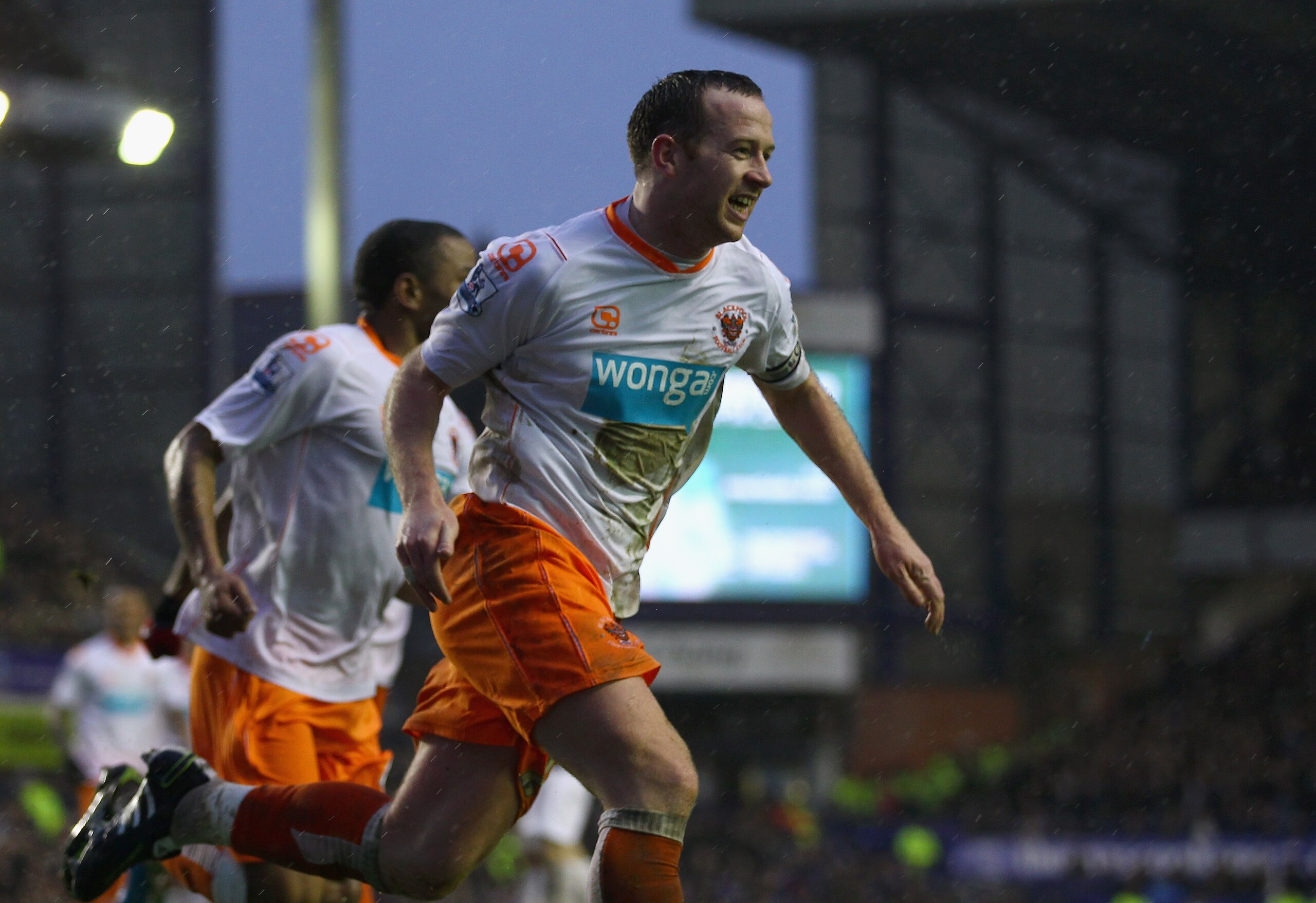 LIVERPOOL, ENGLAND - FEBRUARY 05:  Charlie Adam of Blackpool celebrates after scoring his teams third goal during the Barclays Premier League match between Everton and Blackpool at Goodison Park on February 5, 2011 in Liverpool, England.  (Photo by Clive 
