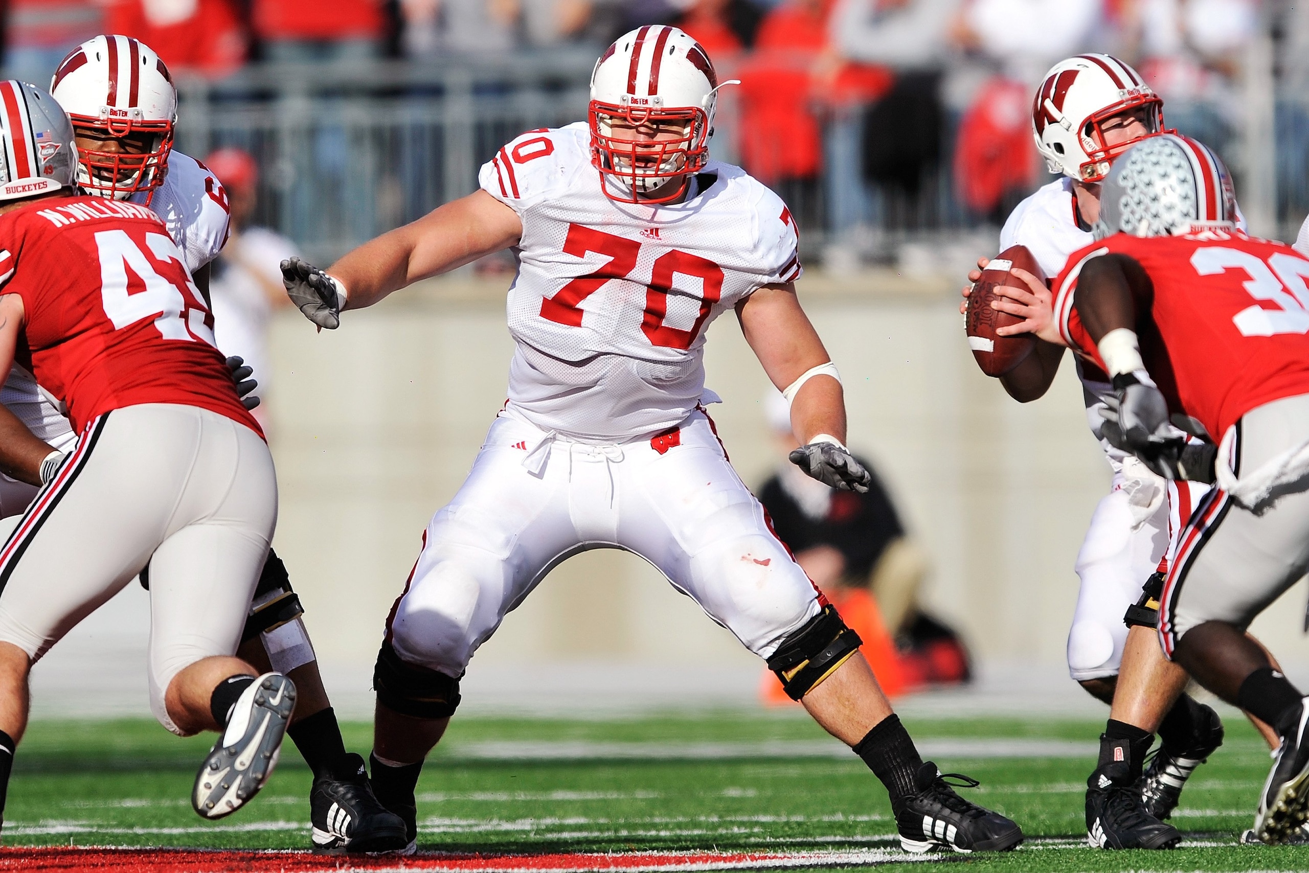 COLUMBUS, OH - OCTOBER 10:  Offensive lineman Kevin Zeitler #70 of the Wisconsin Badgers blocks against the Ohio State Buckeyes at Ohio Stadium on October 10, 2009 in Columbus, Ohio.  (Photo by Jamie Sabau/Getty Images)