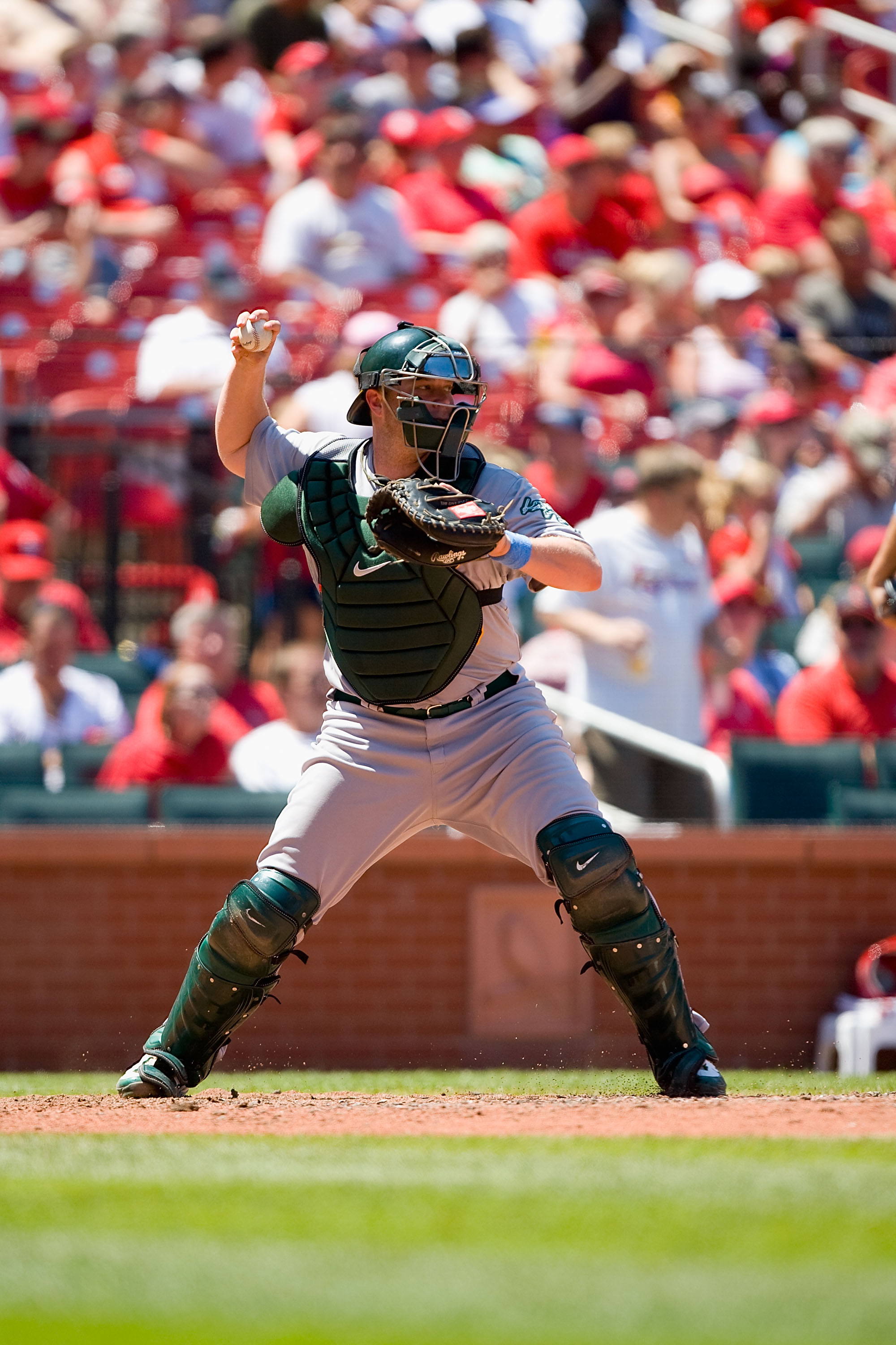 ST. LOUIS - JUNE 20: Landon Powell #35 of the Oakland Athletics throws to second base against the St. Louis Cardinals at Busch Stadium on June 20, 2010 in St. Louis, Missouri.  (Photo by Dilip Vishwanat/Getty Images)