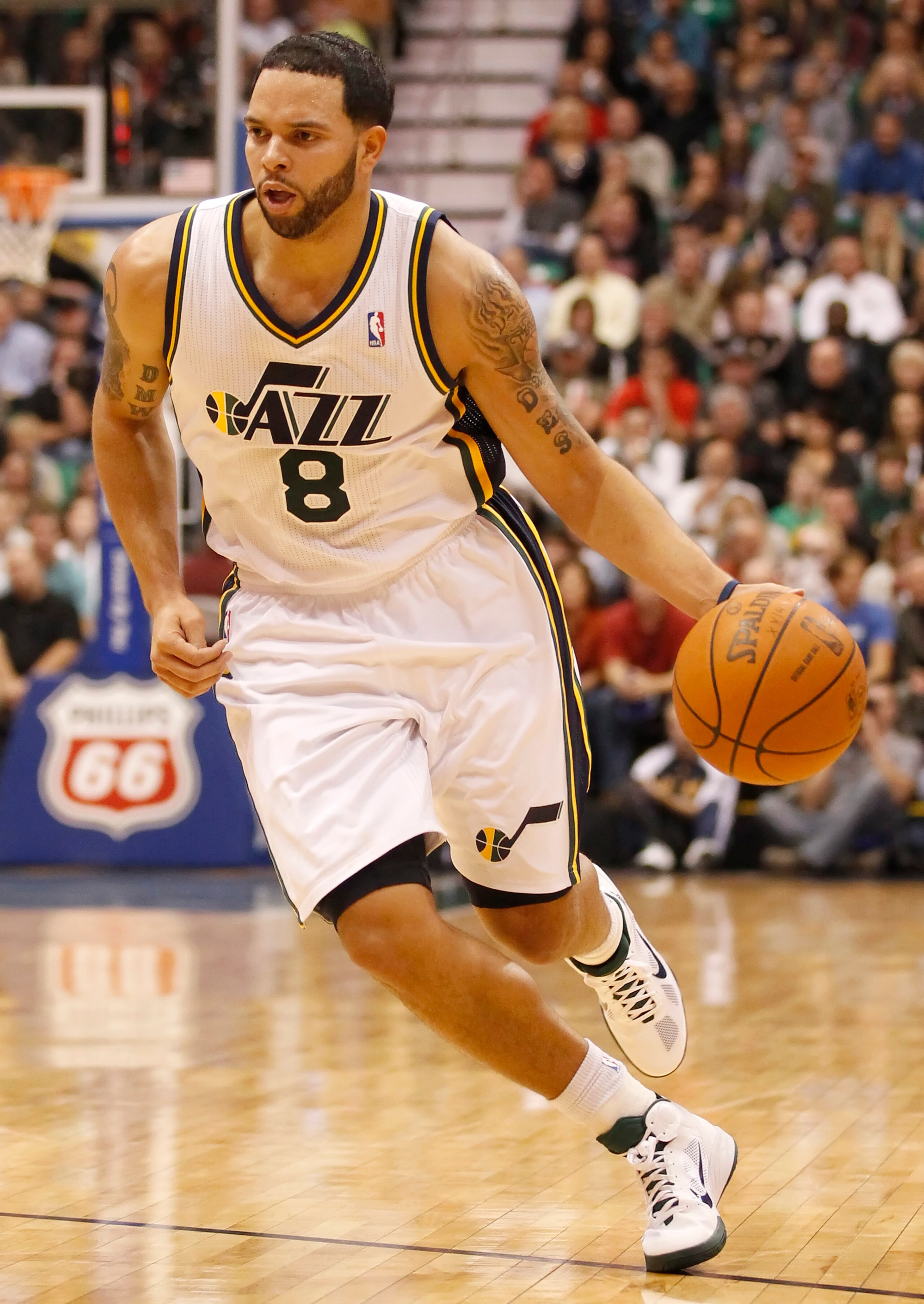 SALT LAKE CITY, UT - DECEMBER 8: Deron Williams #8 of the Utah Jazz drives the ball down court during a game against the Miami Heat during the second half of an NBA game December 8, 2010 at Energy Solutions Arena in Salt Lake City, Utah. The Heat beat th SALT LAKE CITY, UT - DECEMBER 8: Deron Williams #8 of the Utah Jazz drives the ball down court during a game against the Miami Heat during the second half of an NBA game December 8, 2010 at Energy Solutions Arena in Salt Lake City, Utah. The Heat beat th