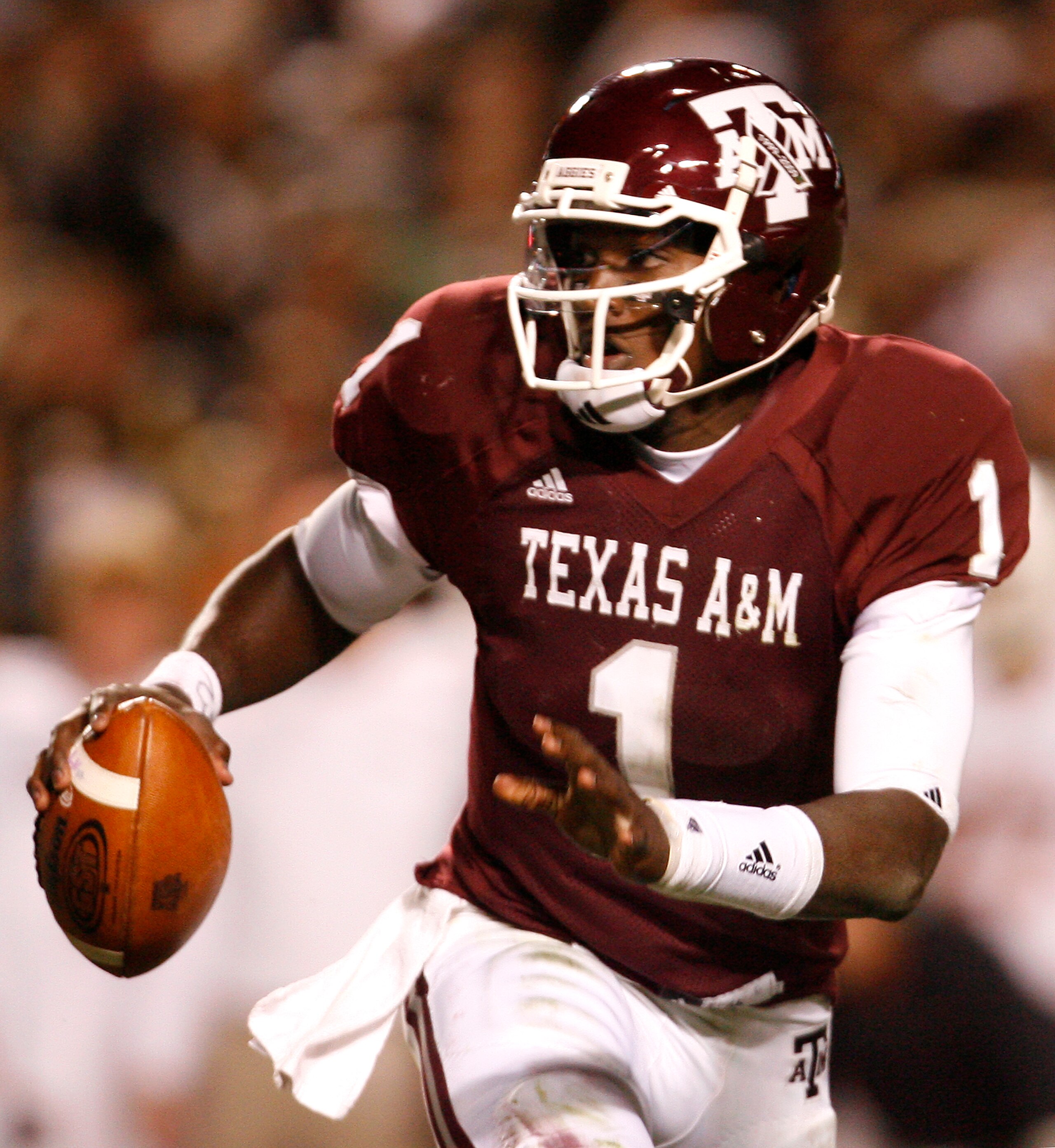 COLLEGE STATION, TX - NOVEMBER 26: Quarterback Jerrod Johnson #1 of the Texas A&M Aggies looks to throw the ball downfield to an open receiver against the Texas Longhorns in the second half at Kyle Field on November 26, 2009 in College Station, Texas. The