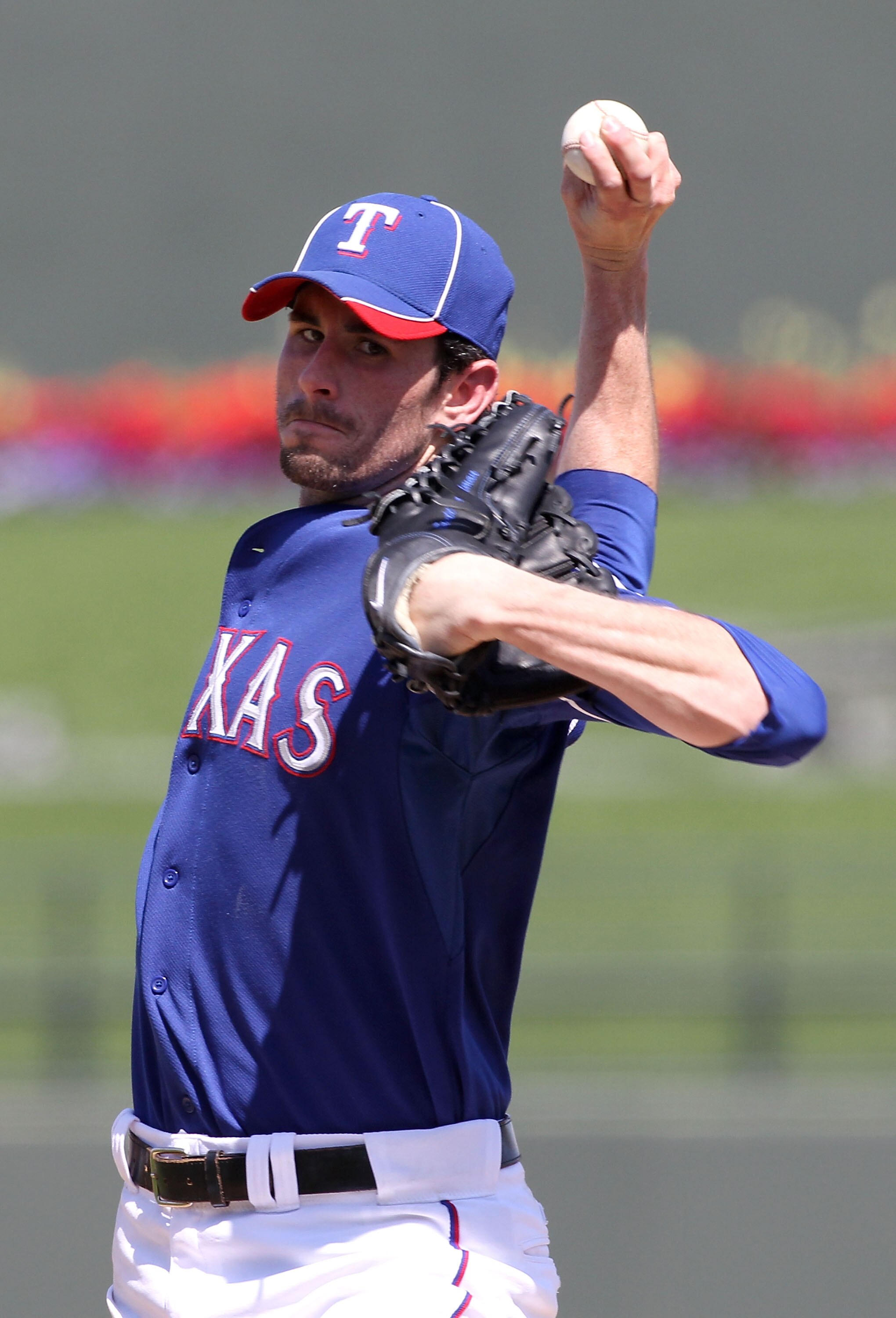 SURPRISE, AZ - MARCH 19:  Starting pitcher Brandon McCarthy #20 of the Texas Rangers pitches against the Cleveland Indians during the MLB spring training game at Surprise Stadium on March 19, 2010 in Surprise, Arizona. The Indians defeated the Rangers 12-