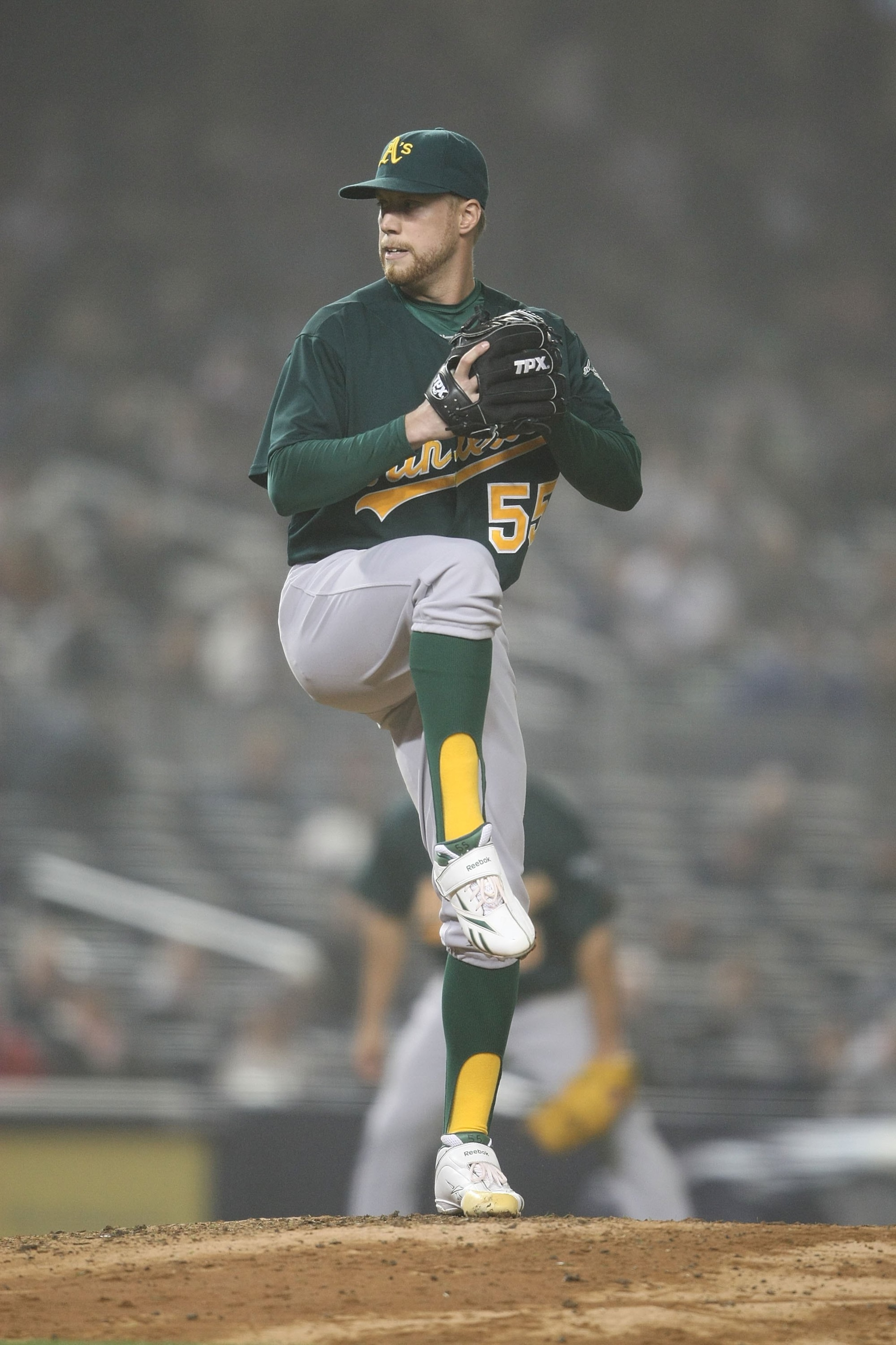 NEW YORK - APRIL 21:  Josh Outman #55 of the Oakland Athletics pitches against the New York Yankees on April 21, 2009 at Yankee Stadium in the Bronx borough of New York City.  (Photo by Nick Laham/Getty Images)