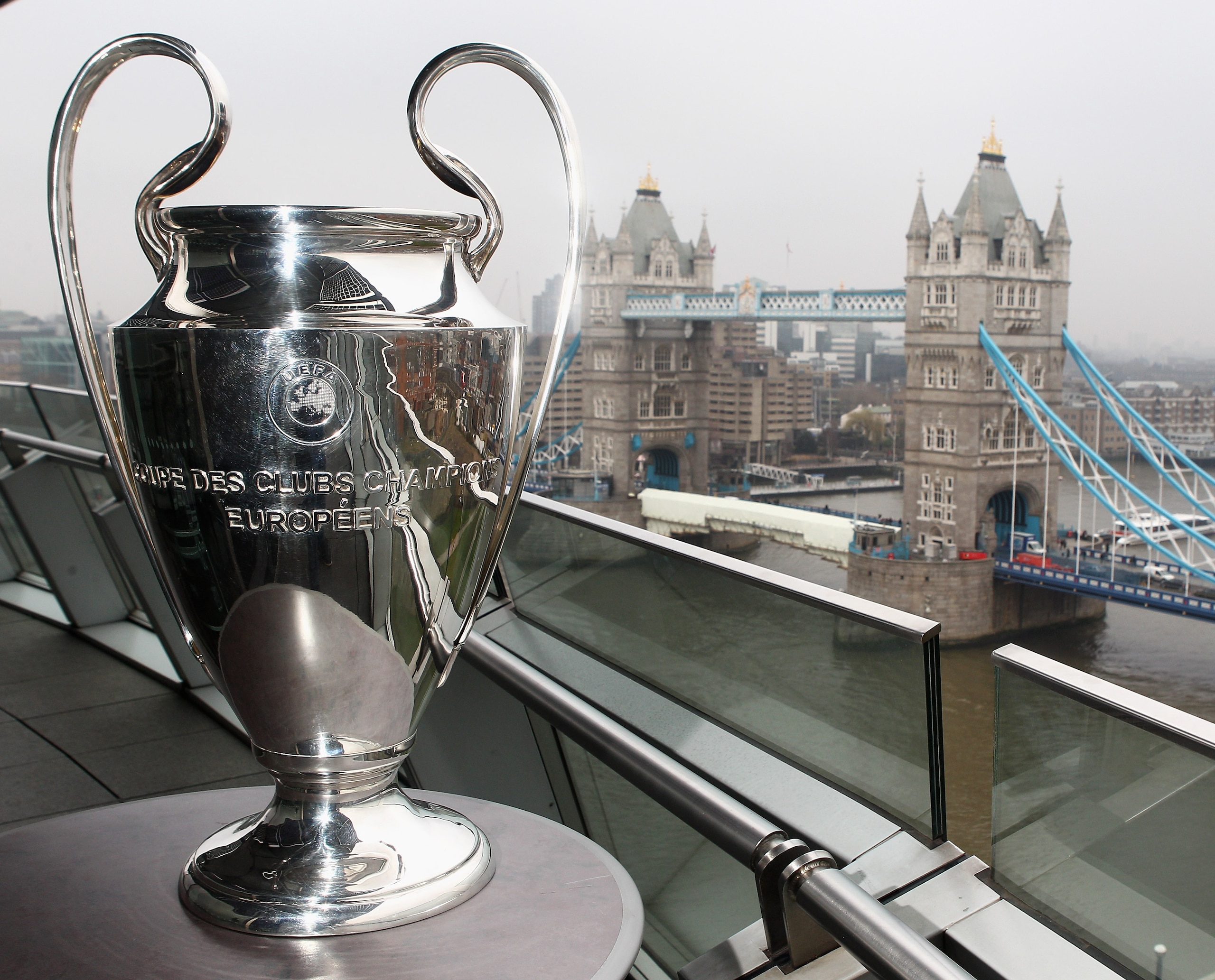 LONDON, ENGLAND - FEBRUARY 17: The Trophy is pictured in front of Tower Bridge during the UEFA Champions League Final 2011 Ticket Launch at City Hall on February 17, 2011 in London, England. (Photo by Dean Mouhtaropoulos/Getty Images) LONDON, ENGLAND - FEBRUARY 17: The Trophy is pictured in front of Tower Bridge during the UEFA Champions League Final 2011 Ticket Launch at City Hall on February 17, 2011 in London, England. (Photo by Dean Mouhtaropoulos/Getty Images)