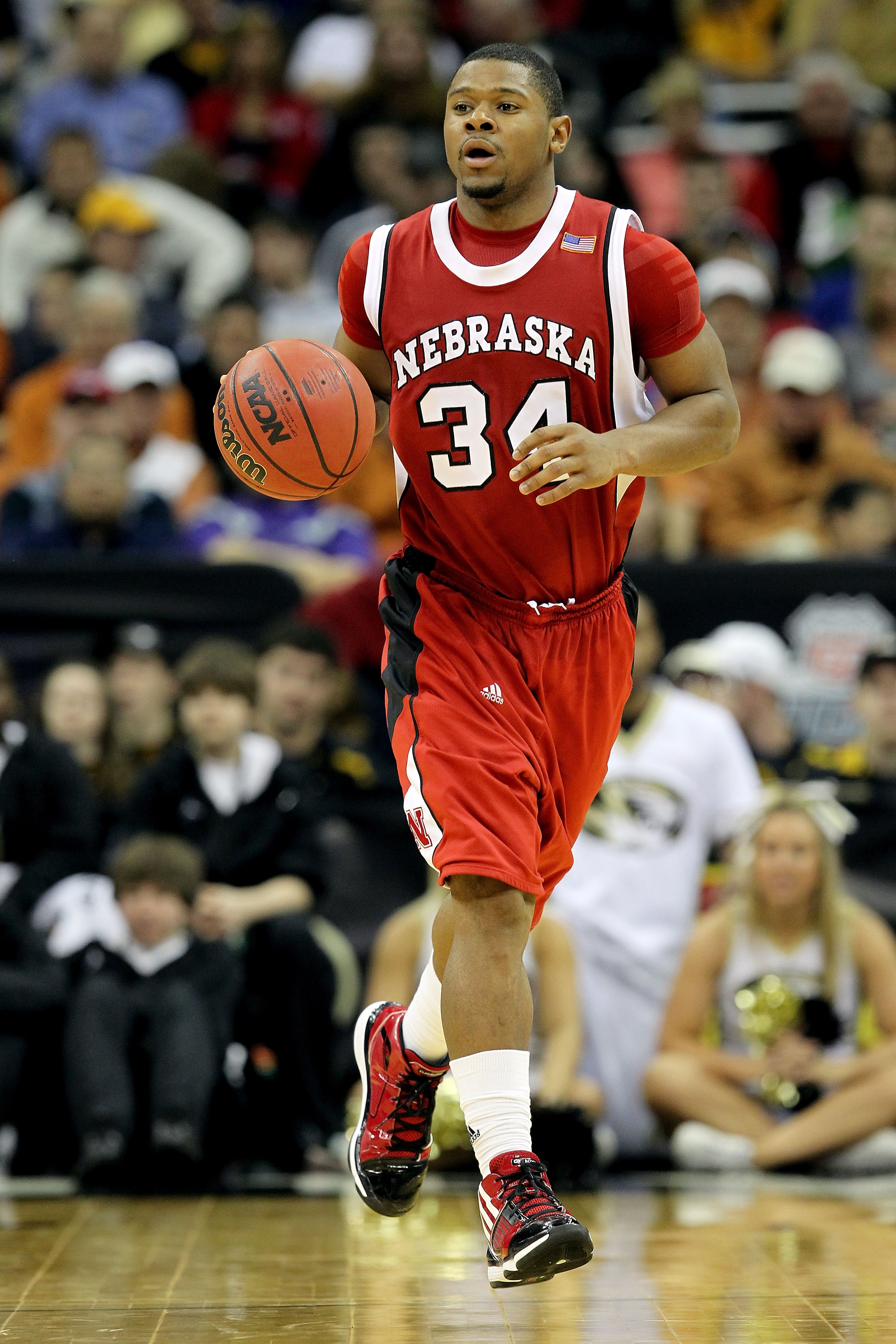 KANSAS CITY, MO - MARCH 10:  Lance Jeter #34 of the Nebraska Cornhuskers moves the ball in the second half against the Missouri Tigers during the first round game of the 2010 Phillips 66 Big 12 Men's Basketball Tournament at the Sprint Center on March 10,