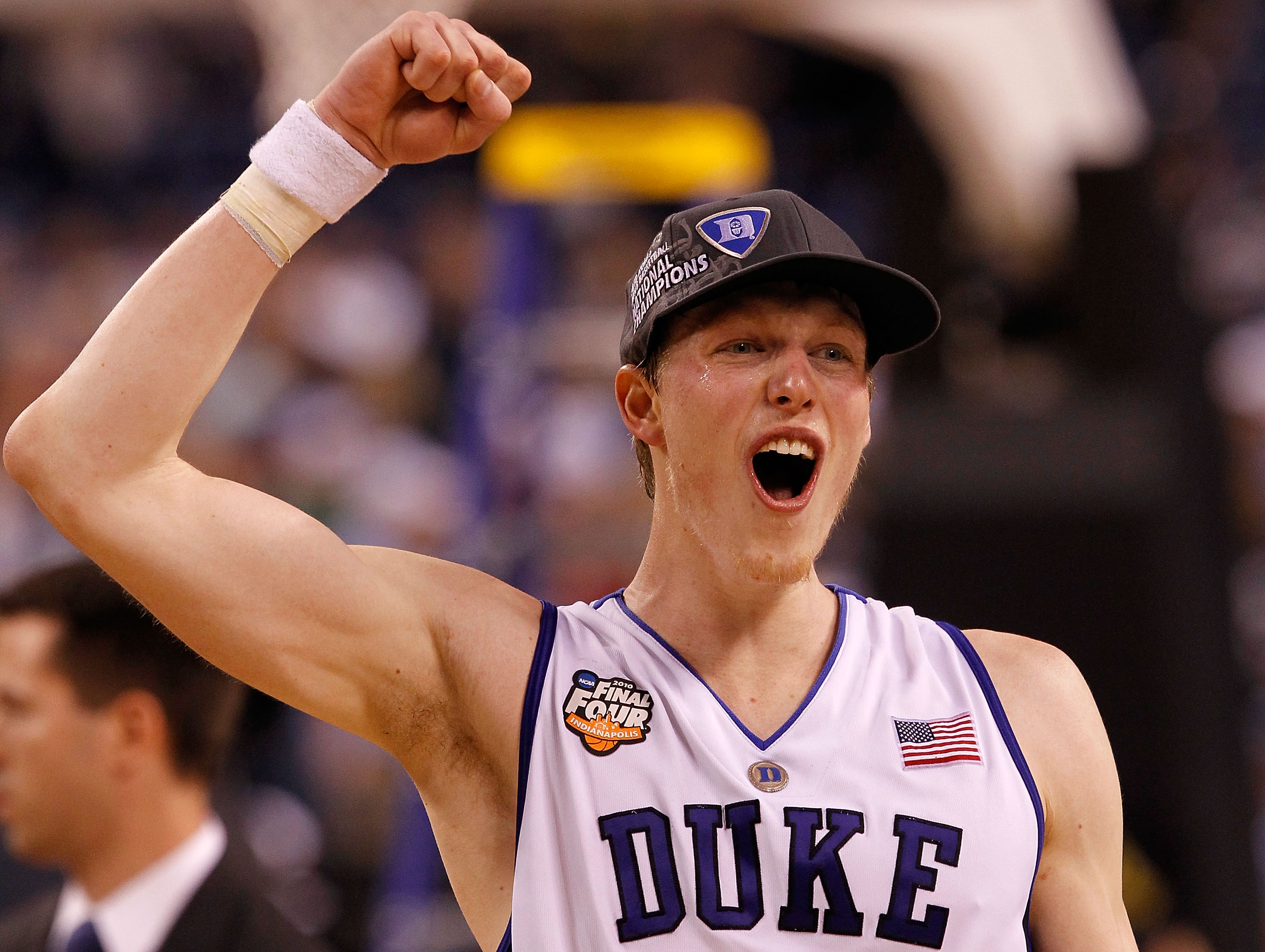 INDIANAPOLIS - APRIL 05:  Kyle Singler #12 of the Duke Blue Devils celebrates their 61-59 win against the Butler Bulldogs during the 2010 NCAA Division I Men's Basketball National Championship game at Lucas Oil Stadium on April 5, 2010 in Indianapolis, In