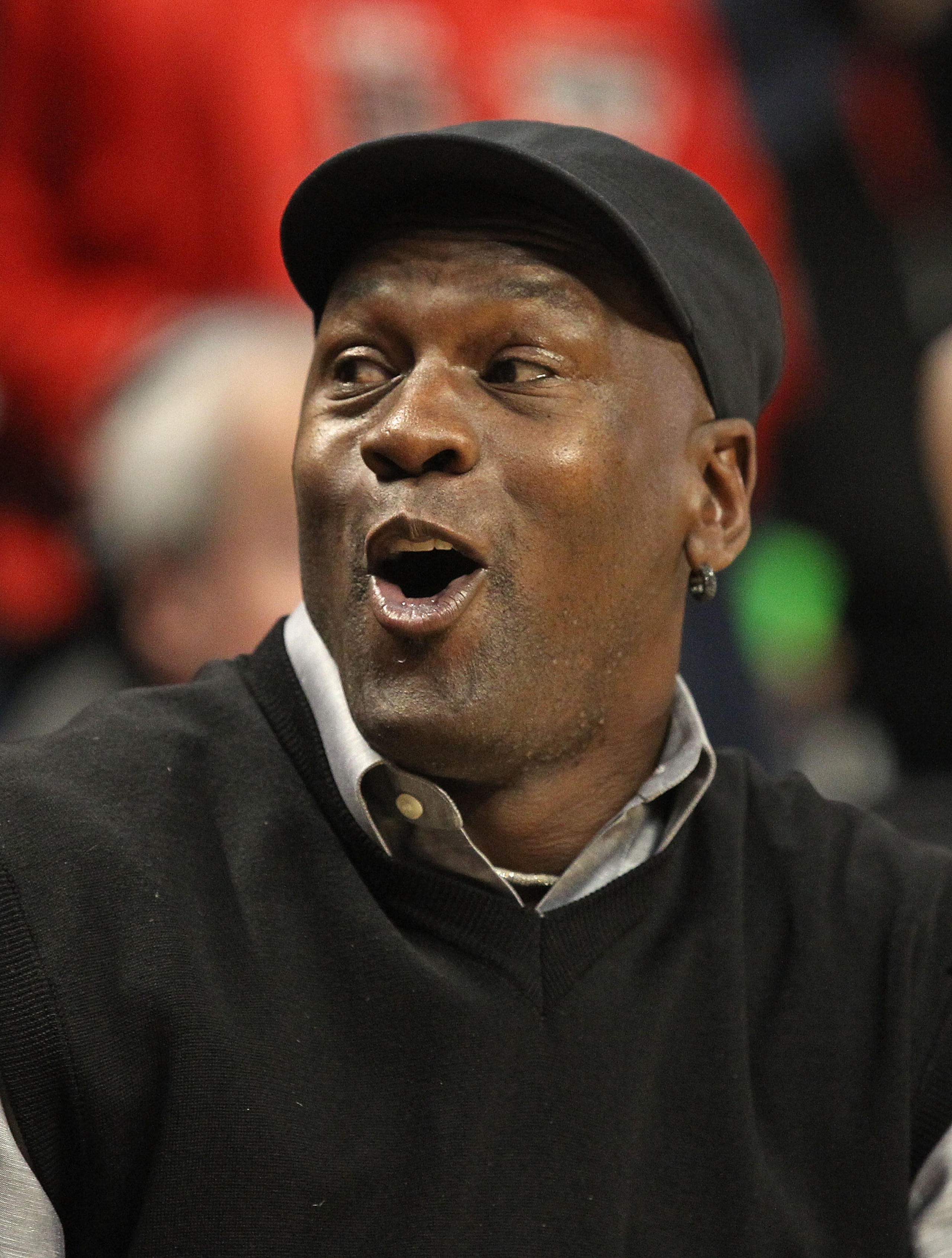 CHICAGO, IL - FEBRUARY 15: Former player Michael Jordan of the Chicago Bulls talks to a fan before the Bulls take on the Charlotte Bobcats at the United Center on February 15, 2011 in Chicago, Illinois. NOTE TO USER: User expressly acknowledges and agrees CHICAGO, IL - FEBRUARY 15: Former player Michael Jordan of the Chicago Bulls talks to a fan before the Bulls take on the Charlotte Bobcats at the United Center on February 15, 2011 in Chicago, Illinois. NOTE TO USER: User expressly acknowledges and agrees