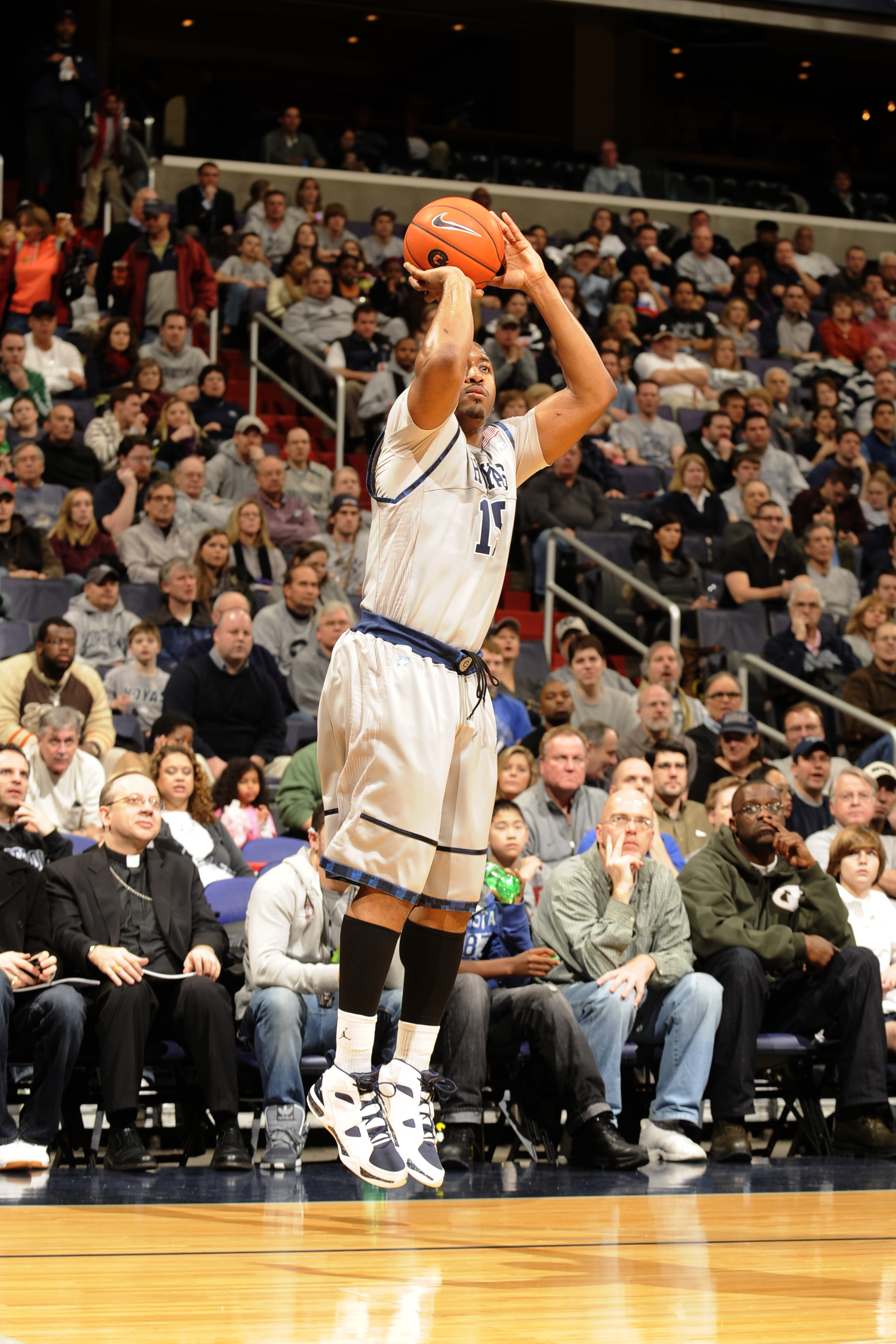 WASHINGTON, DC - FEBRUARY 5:  Austin Freeman #15 of the Georgetown Hoyas takes a jump shot during a college basketball game against the Providence Friars on February 5, 2011 at the Verizon Center in Washington, DC.  The Hoyas won 83-81.  (Photo by Mitchel